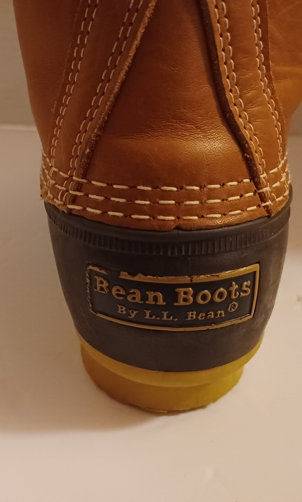 L.L. Bean Boots Duck Boots Feature A Lace Up Closure With Pull Tab On Back.