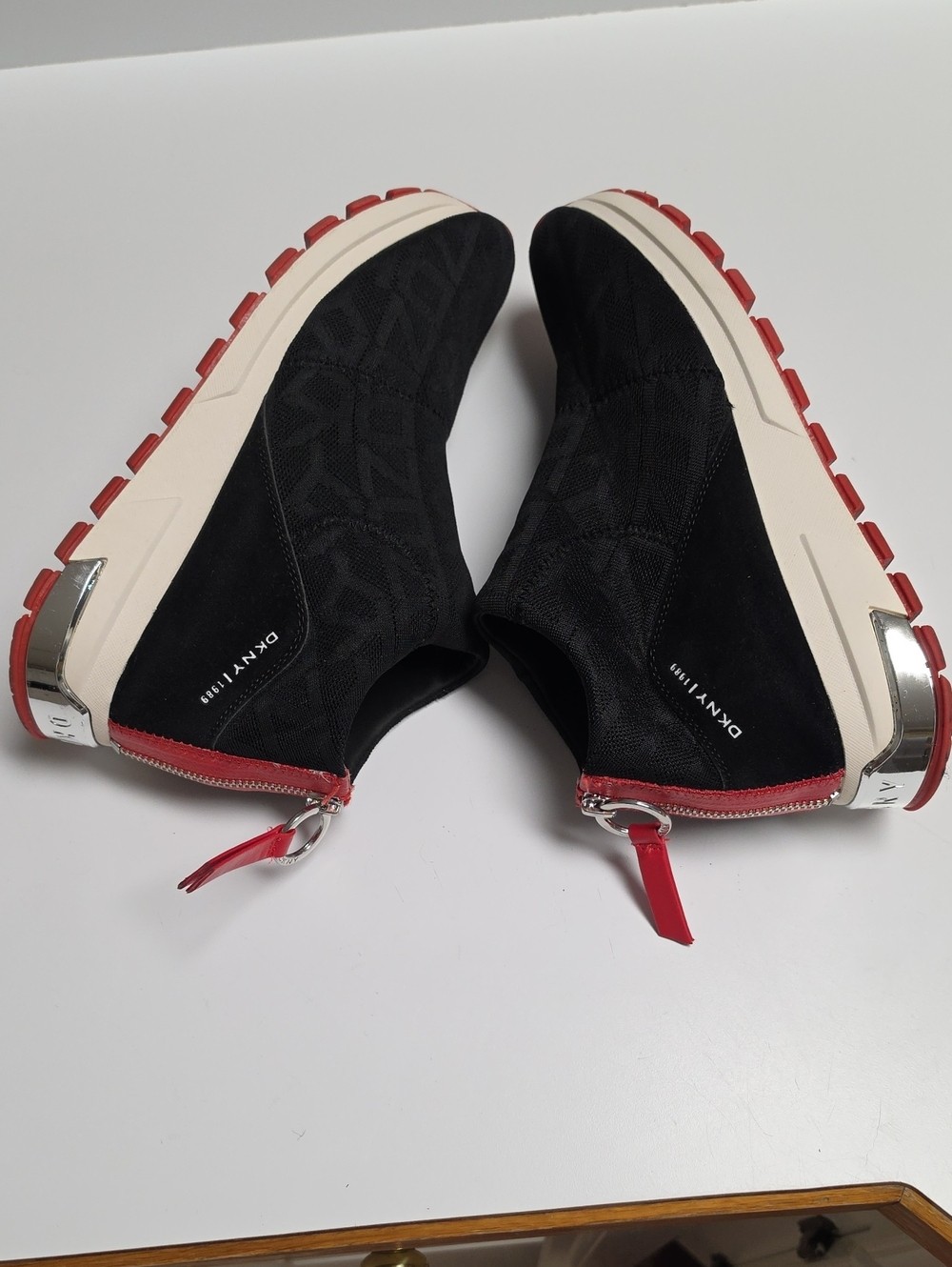 DKNY Mylo Knit Sock Slip-On Sneakers – Black/Red Zipper Accent – Size 11