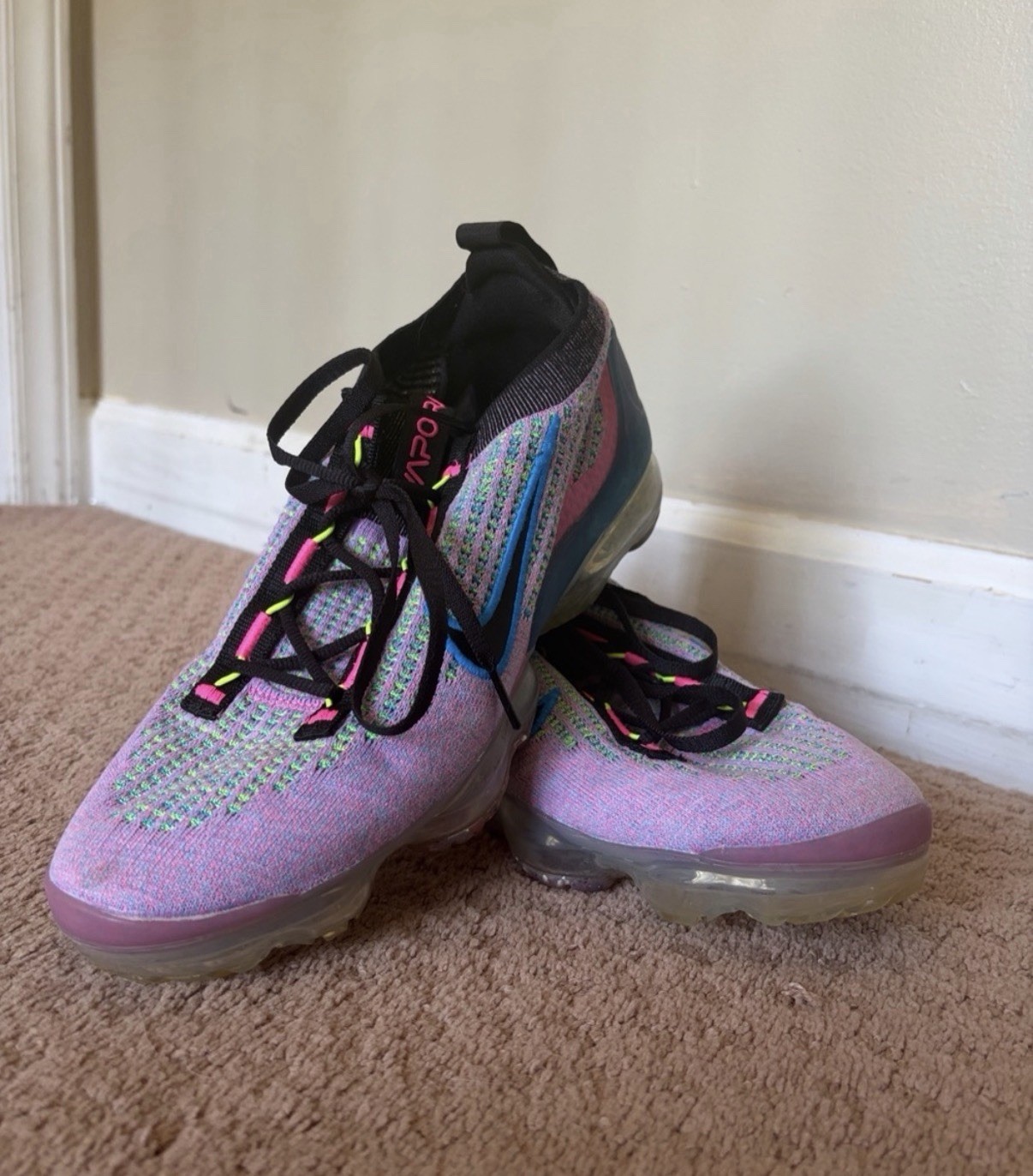 Nike women’s Pink MulticolorKnit Sneakers with BlackDetails