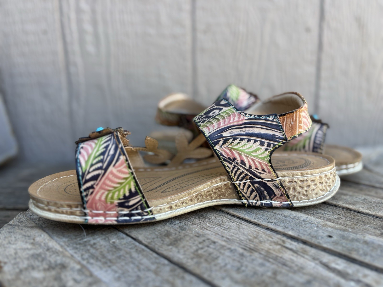 L’Artiste by Spring Step leather sandals with decorative floral embellishments