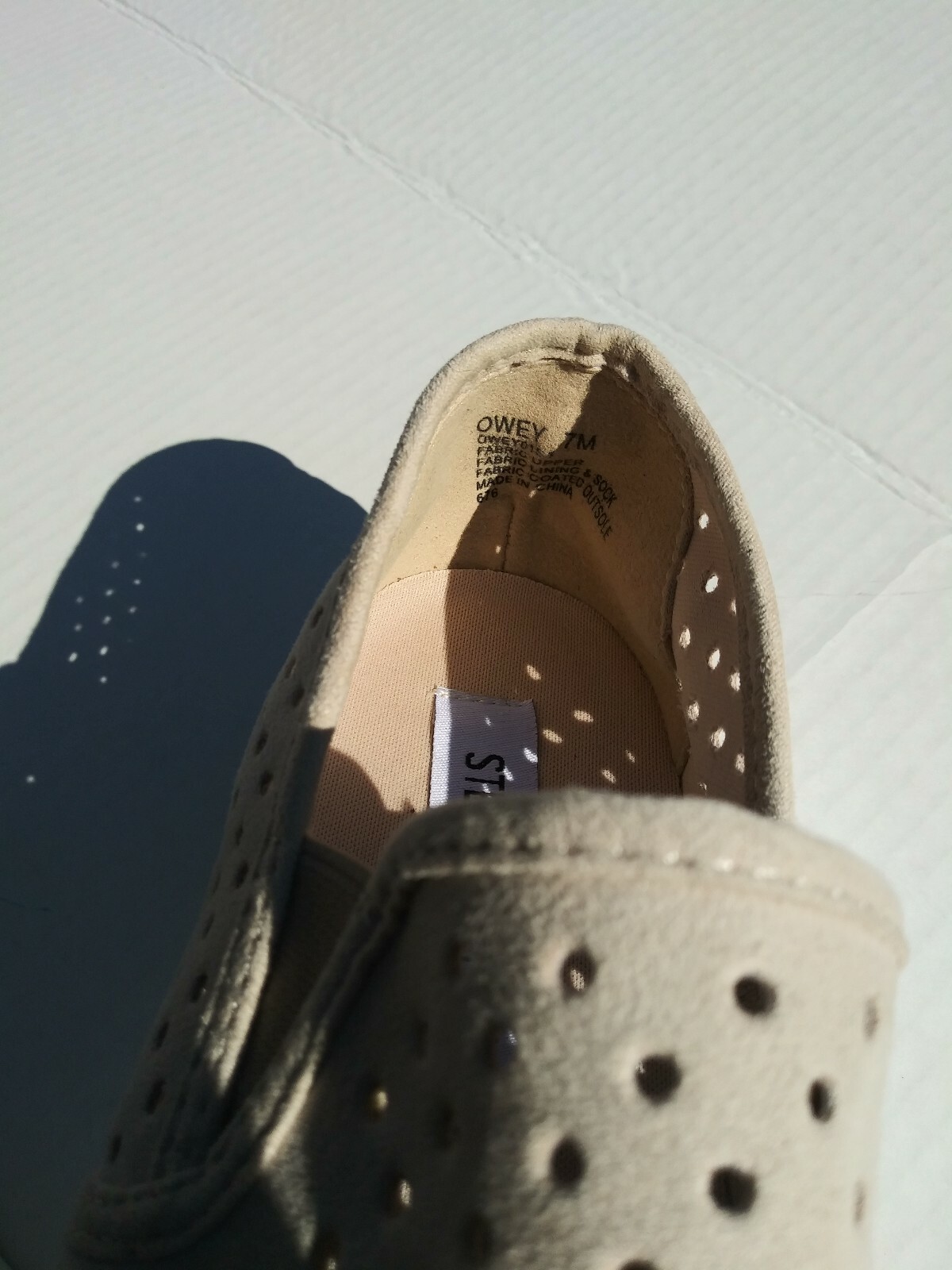 Steve Madden Owey perforated slip-on sneaker (Different Sizes – Left 7, Right 8)
