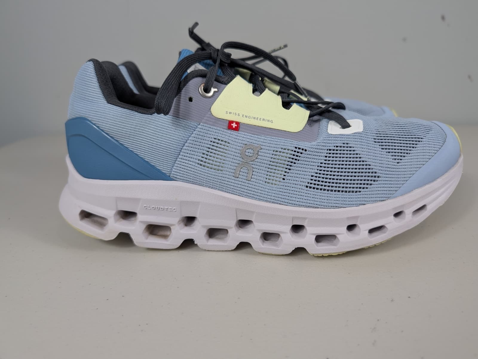 On cloud stratus sneakers in a chambray/lavender blue color women’s size 10W