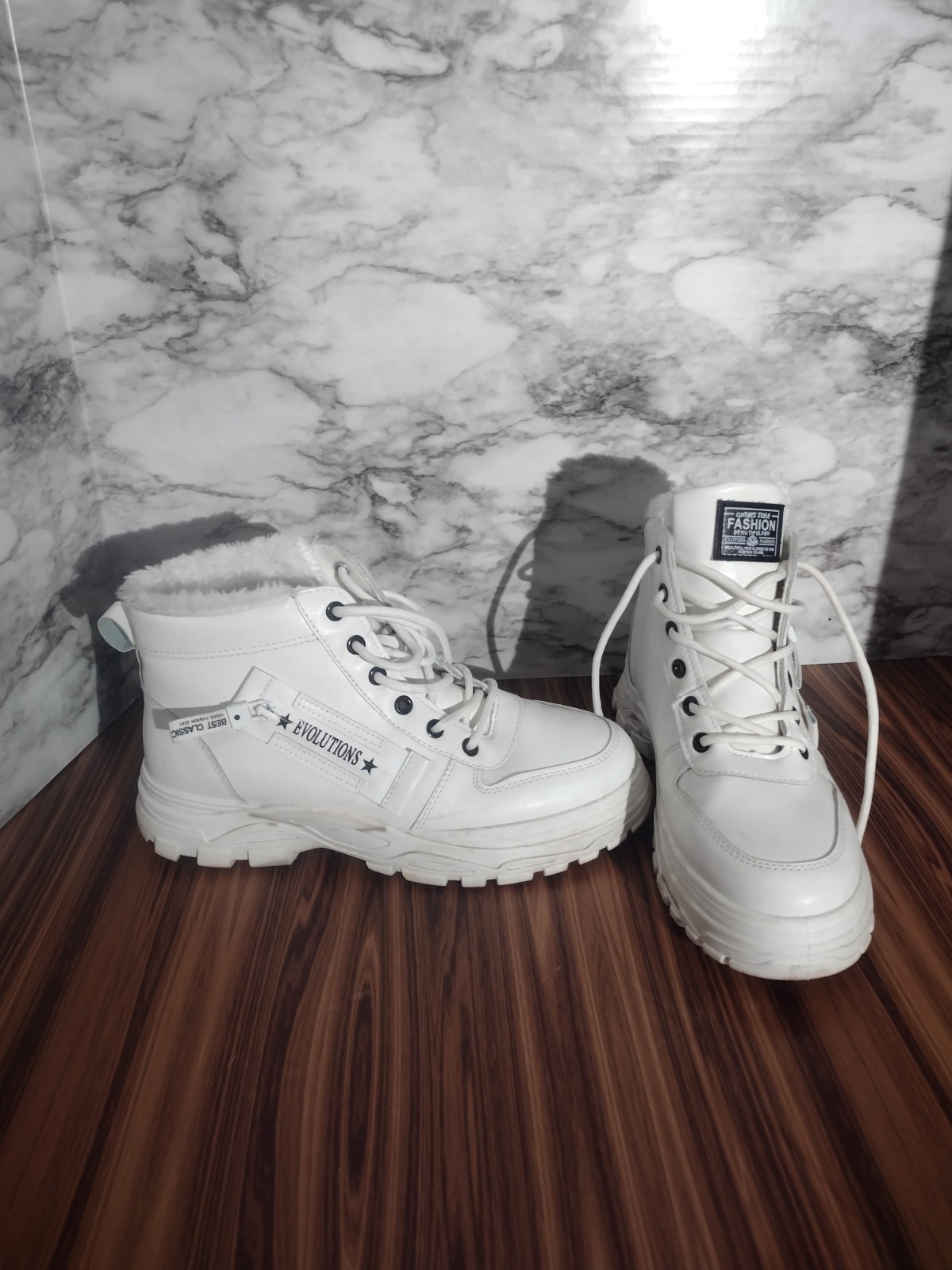 evolutions white fur lined low top boots