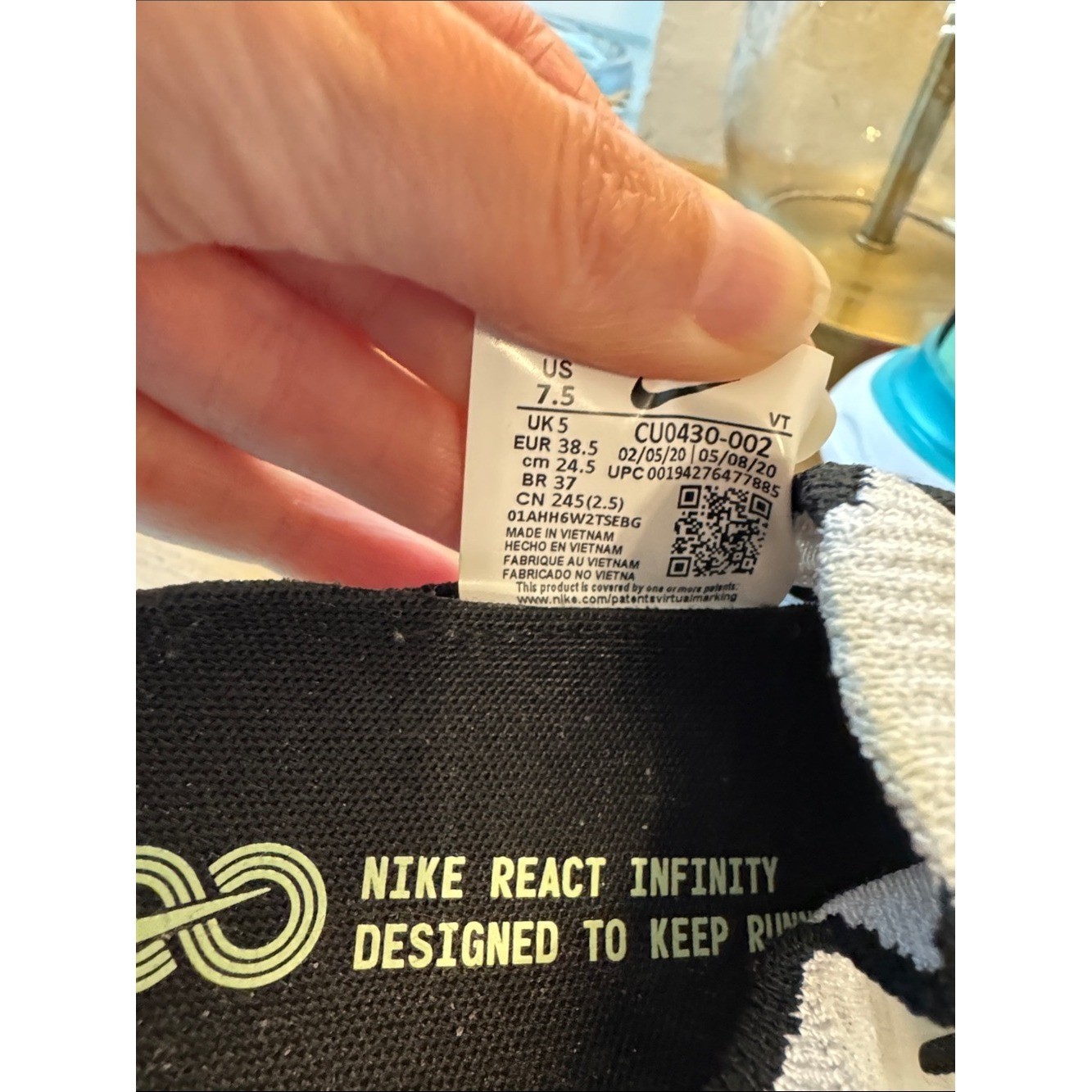 Nike React Infinity White Athletic Sneakers with Teal, Yellow & Red Accents