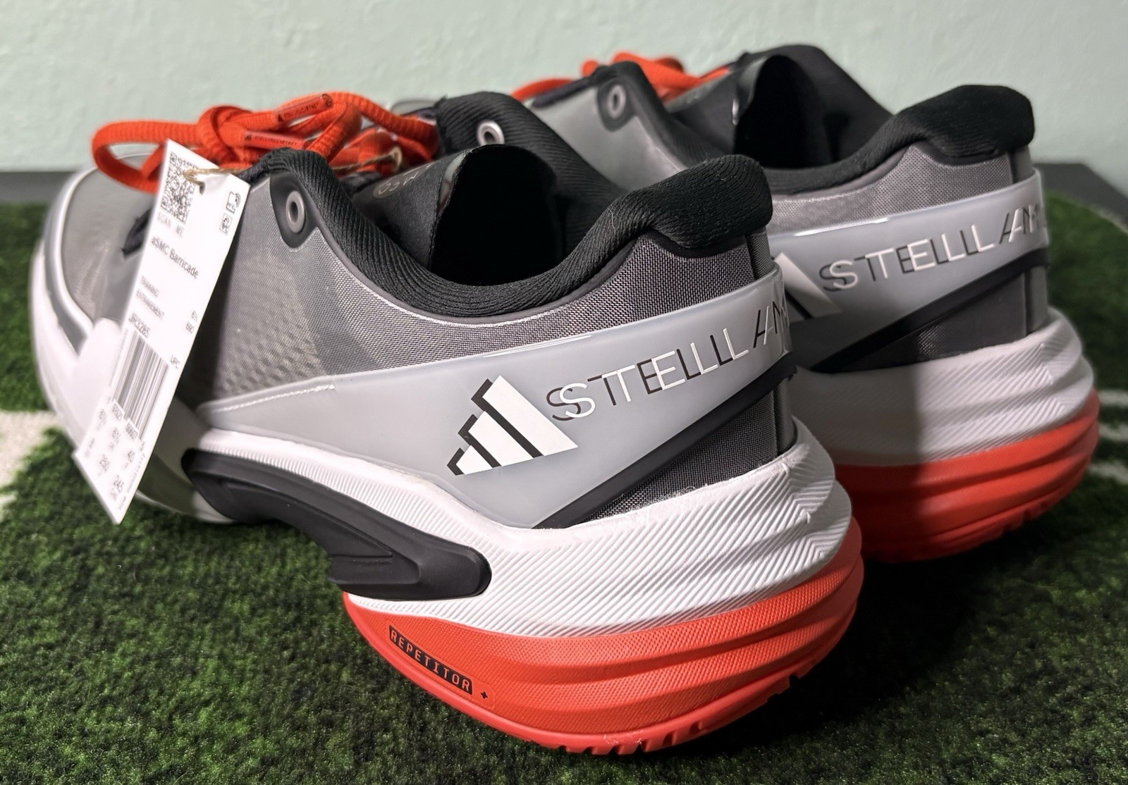 US W 8/M 7 – Stella McCartney x Adidas Barricade “Charcoal Orange” JR3285