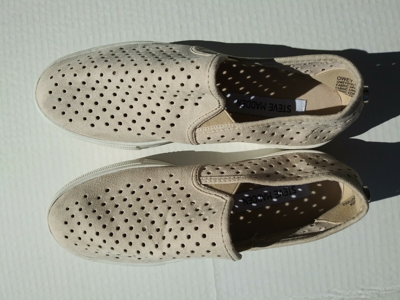 Steve Madden Owey perforated slip-on sneaker (Different Sizes – Left 7, Right 8)