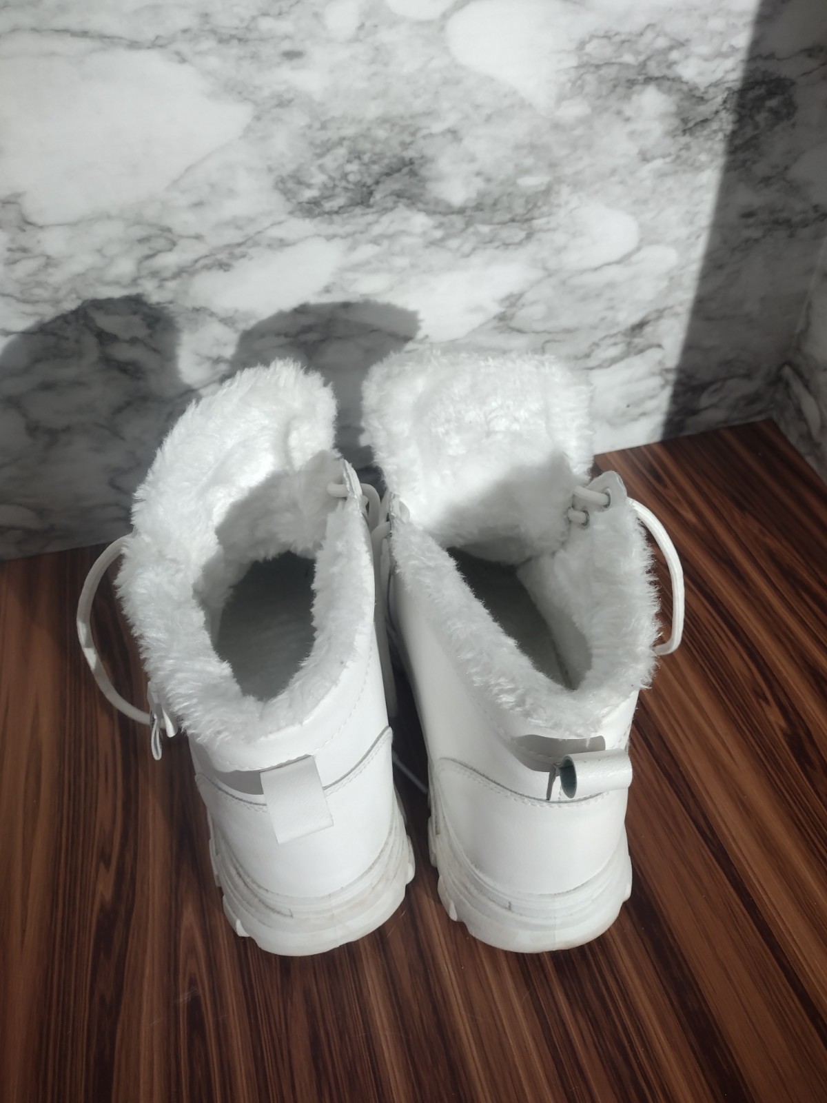evolutions white fur lined low top boots