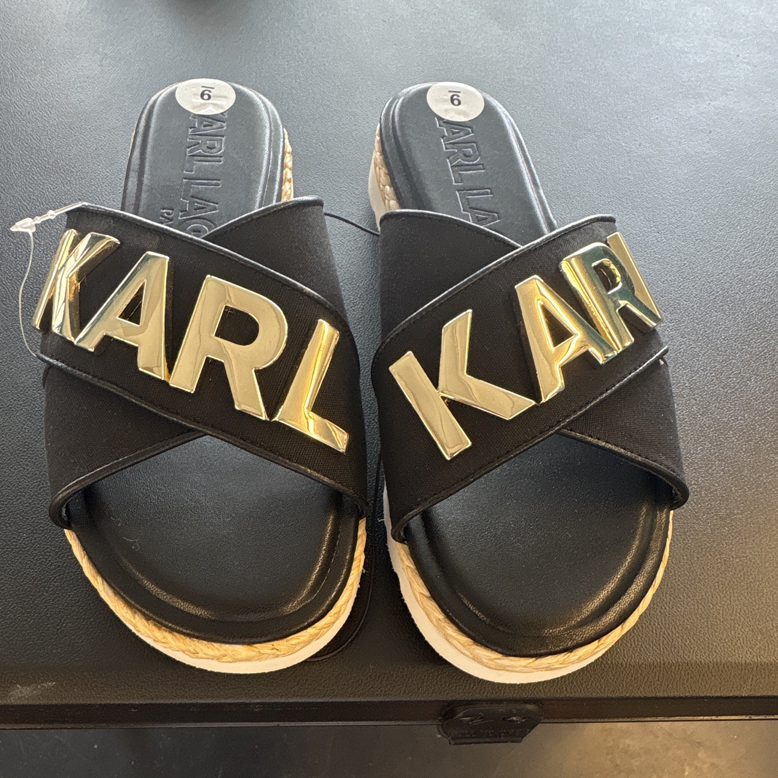 KARL LAGERFELD PARIS Women’s Leather Logo Slide Sandals Black/Gold US 9