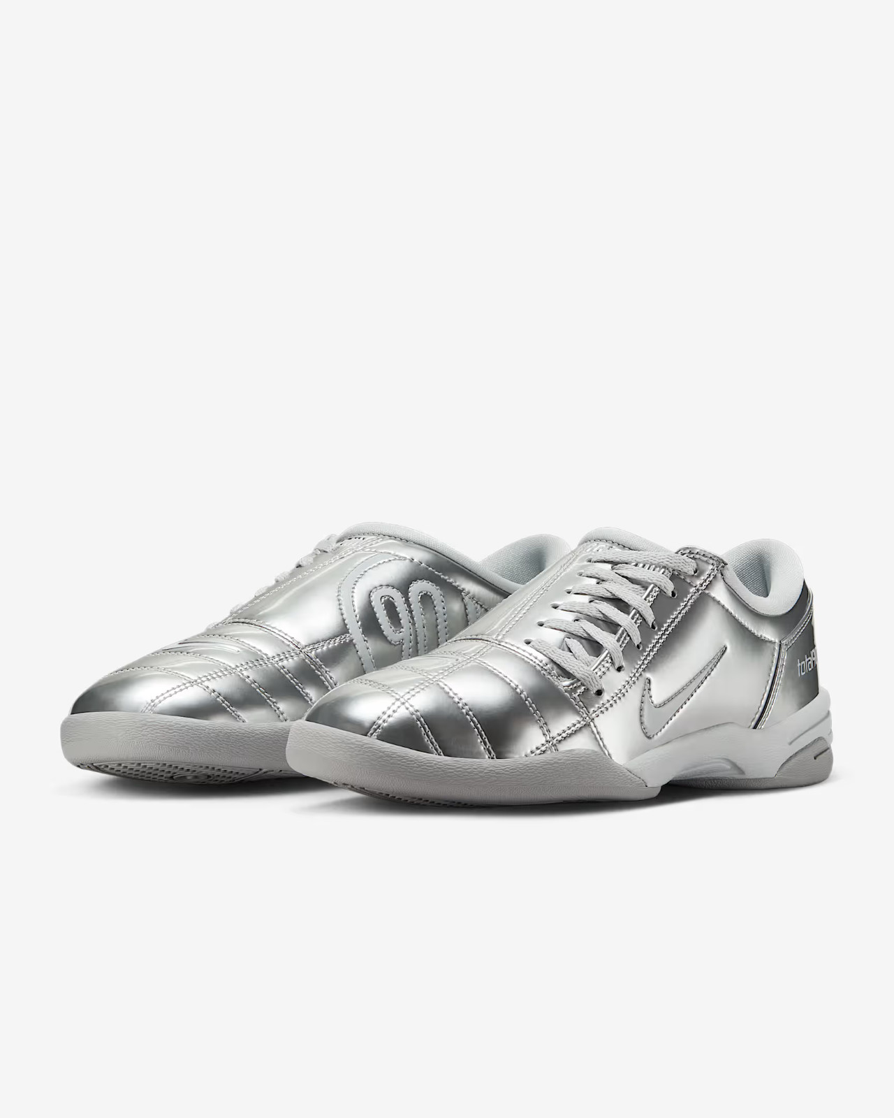 II9792-011 Nike Total 90 3 Metallic Platinum (Women’s)