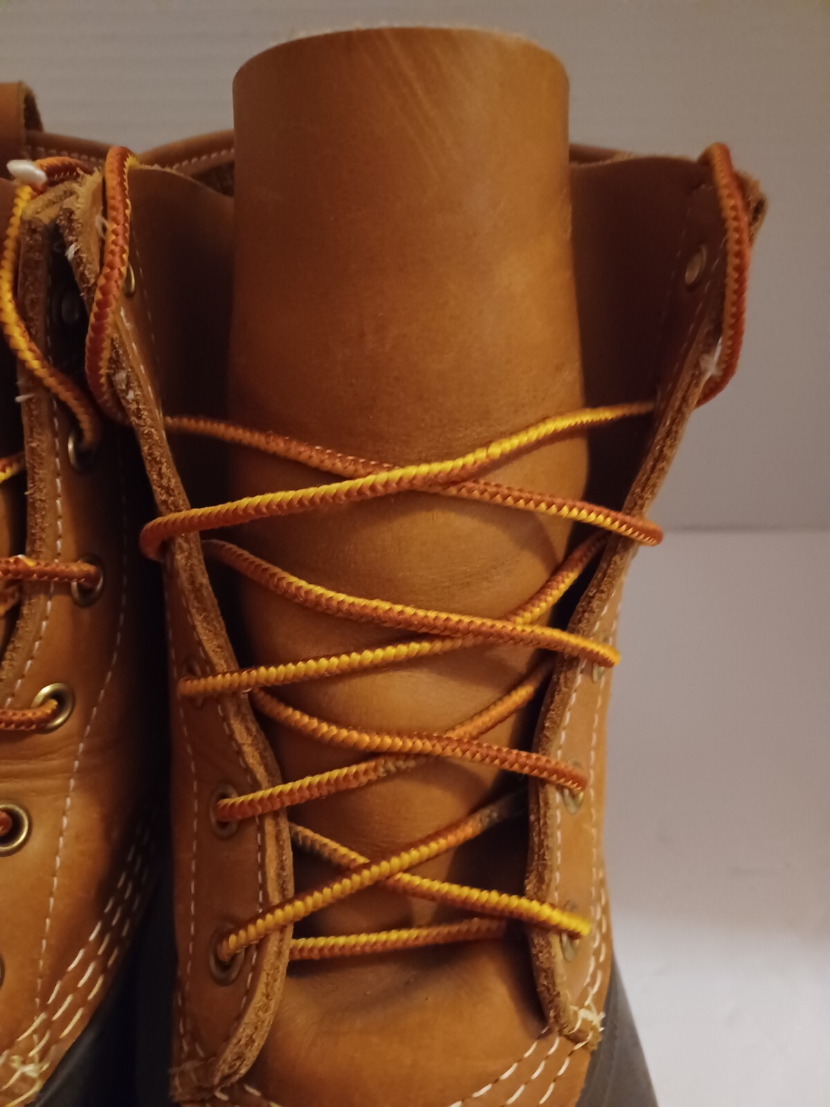 L.L. Bean Boots Duck Boots Feature A Lace Up Closure With Pull Tab On Back.