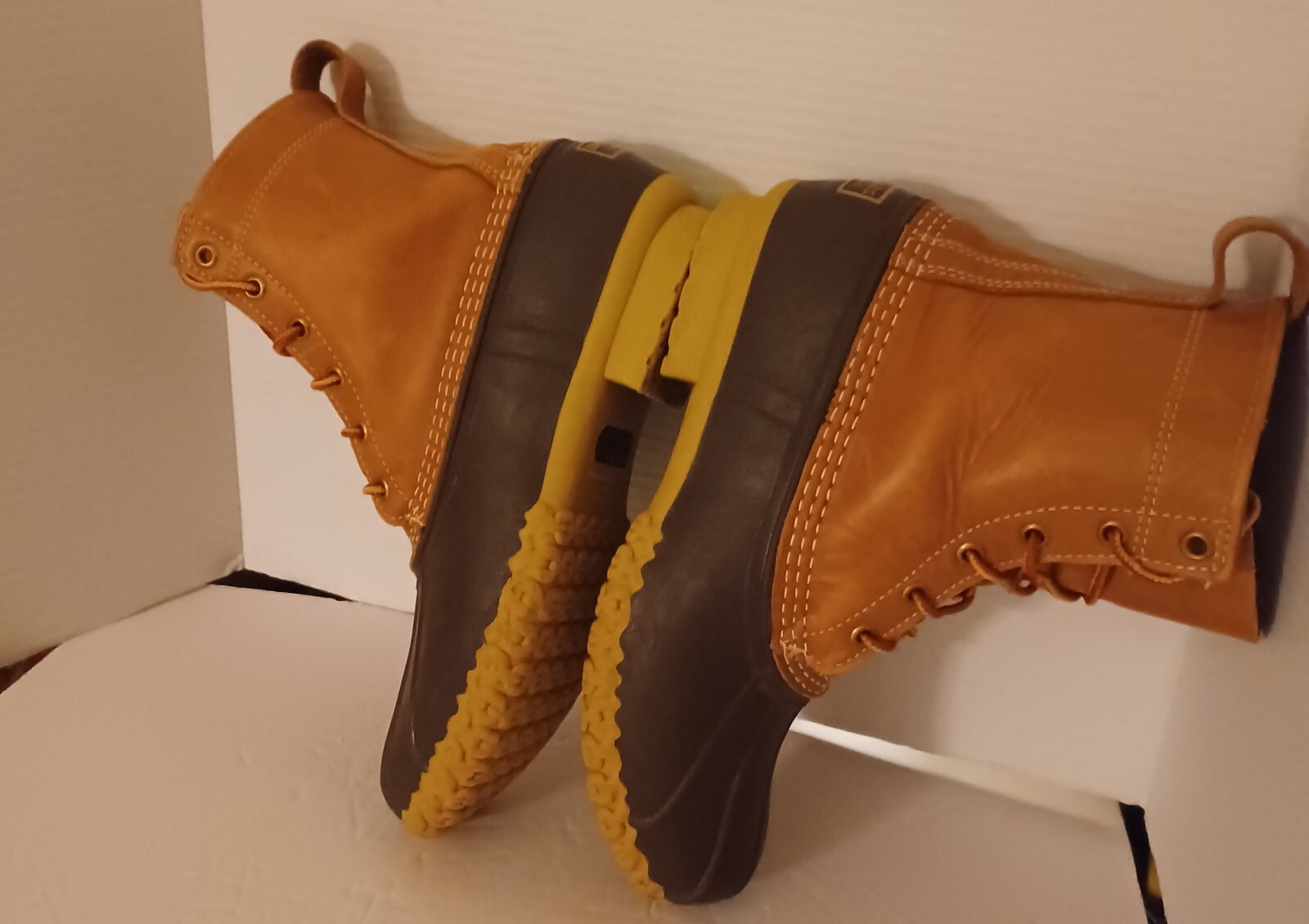 L.L. Bean Boots Duck Boots Feature A Lace Up Closure With Pull Tab On Back.