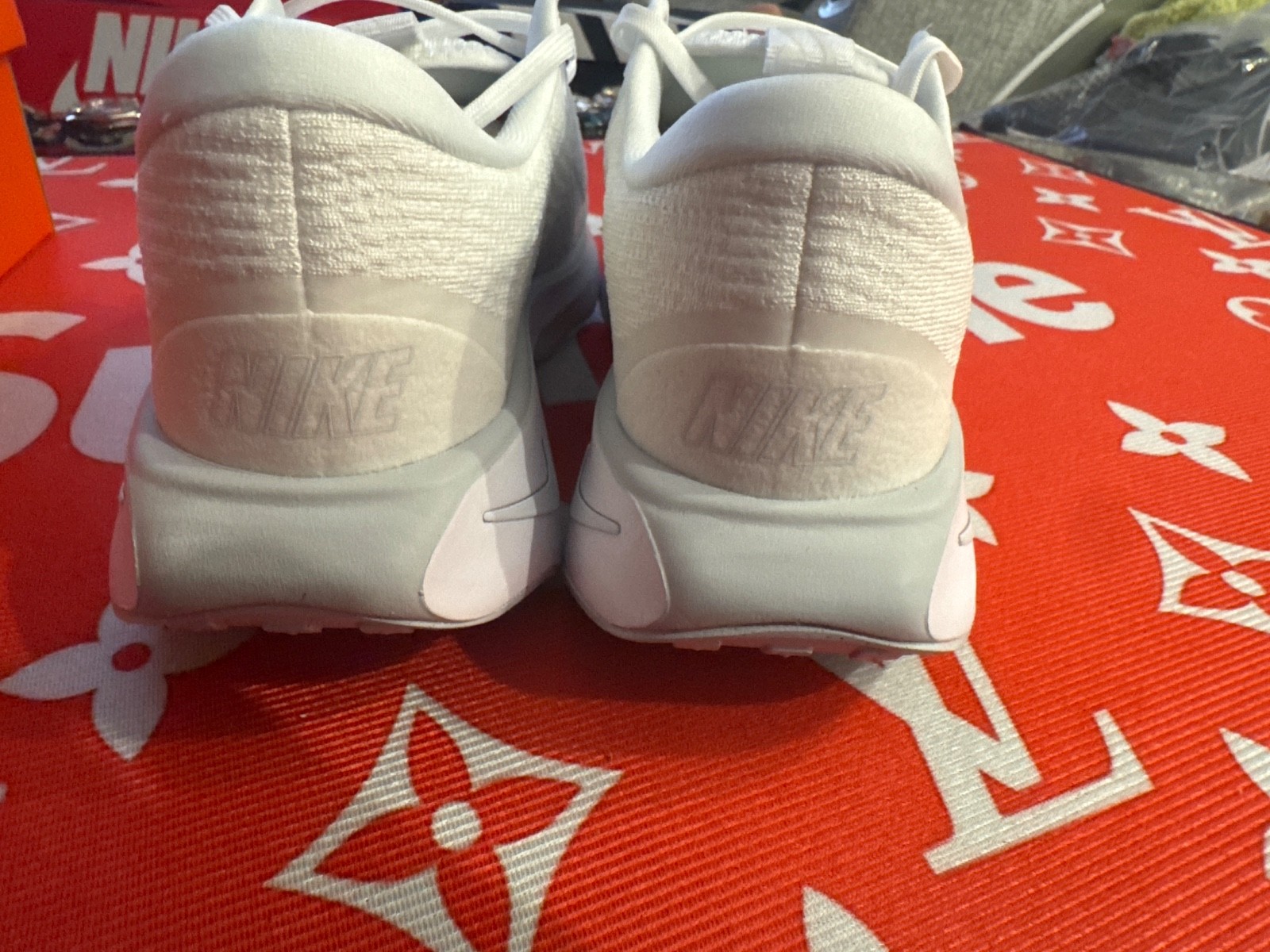 Nike Motiva walking shoe features a thick, sculpted sole designed for comfort