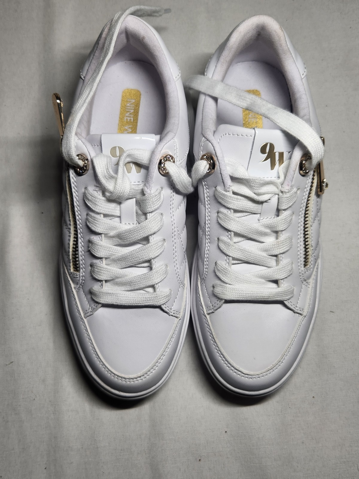 Women’s White Quilted Sneakers Size 8M – Gold Zipper Accent & Logo Detail