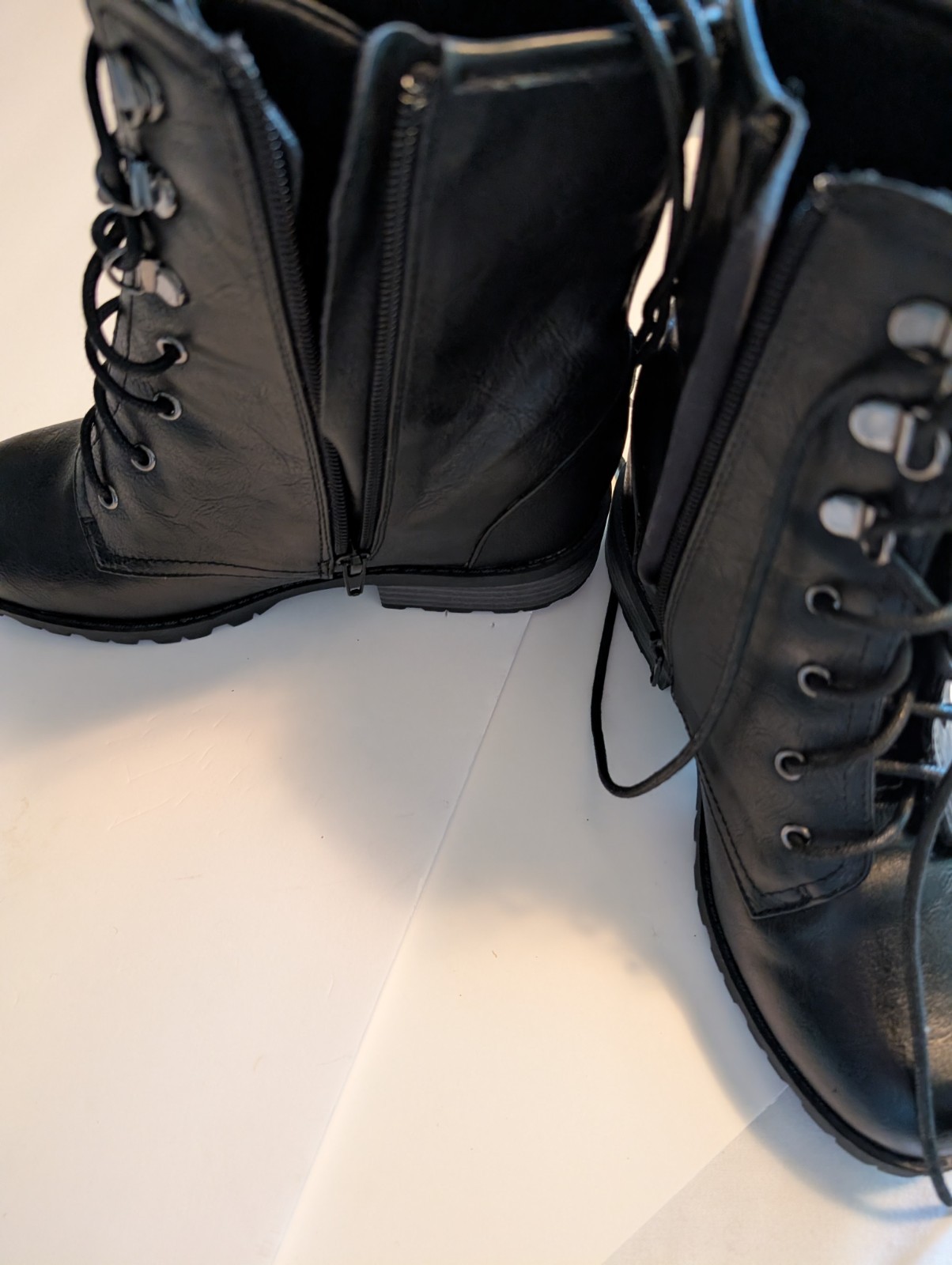 Black faux leather women’s lace up with silver accents boots size 6.5