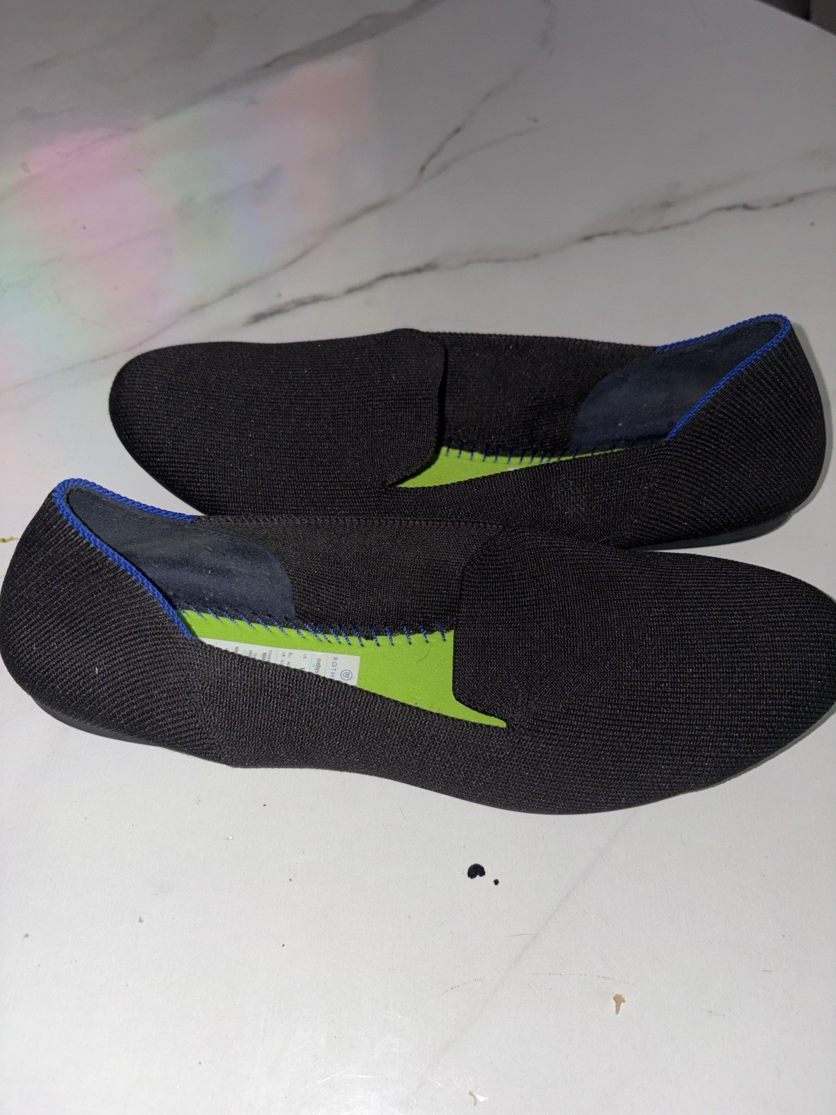 Rothy’s Black Slip-On Loafers with Blue-Trim Insoles