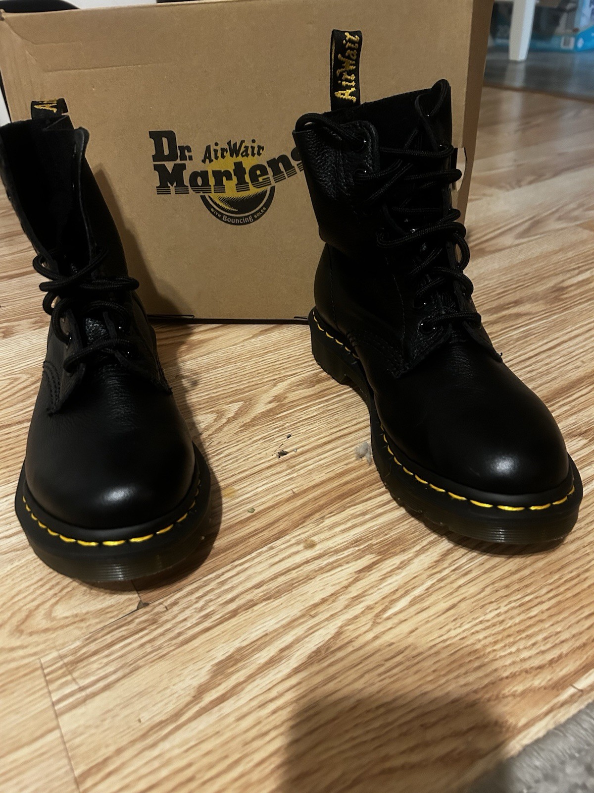 Brand new, never worn Dr. Martens 1460 Pascal boots in black pebbled leather.