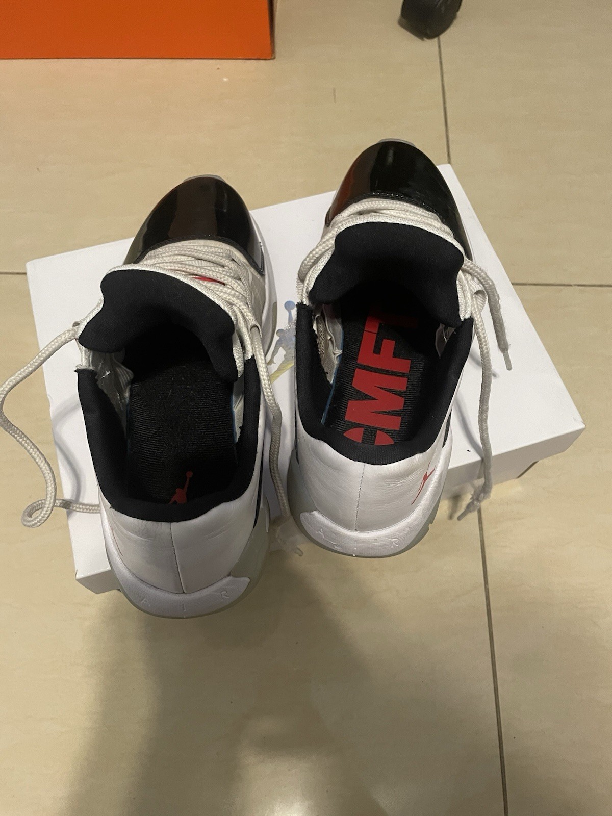Jordan WMNS Air Jordan 11 CMFT Low White/Black/Red Blue Tint DV2629-106 2023