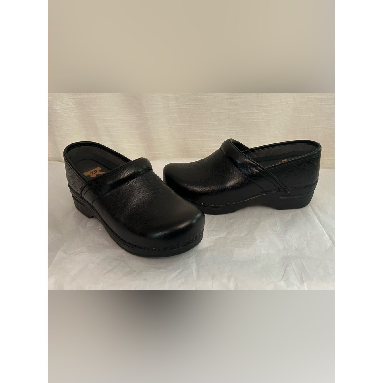 Dansko Black Leather Slip-On Clogs