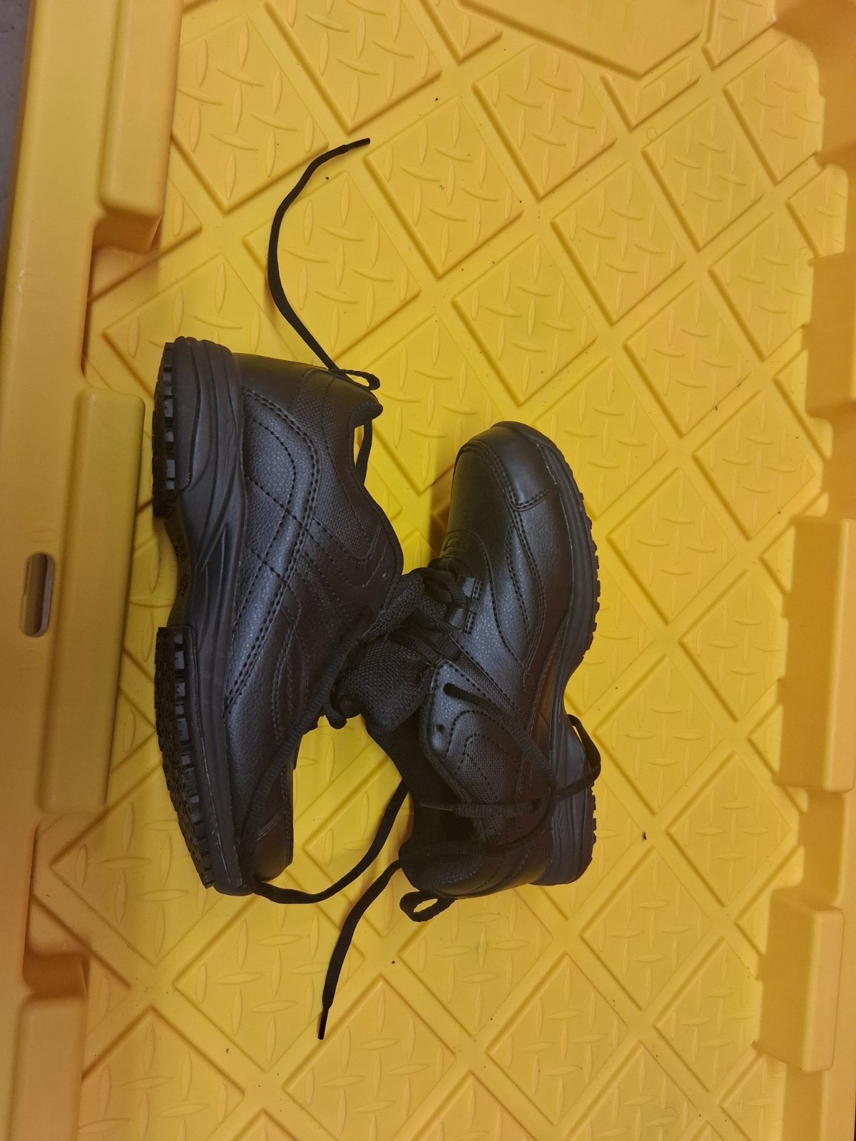 SafeTstep brand, durable faux leather upper and a classic lace-up design