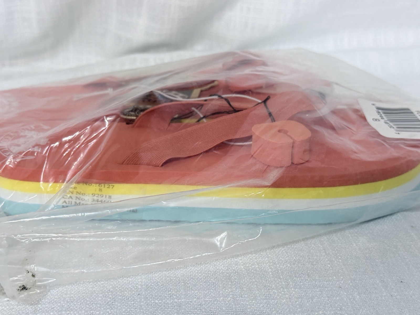 Juicy Couture colorful multi-layer flip-flops. NWT Sealed Bag Size 8