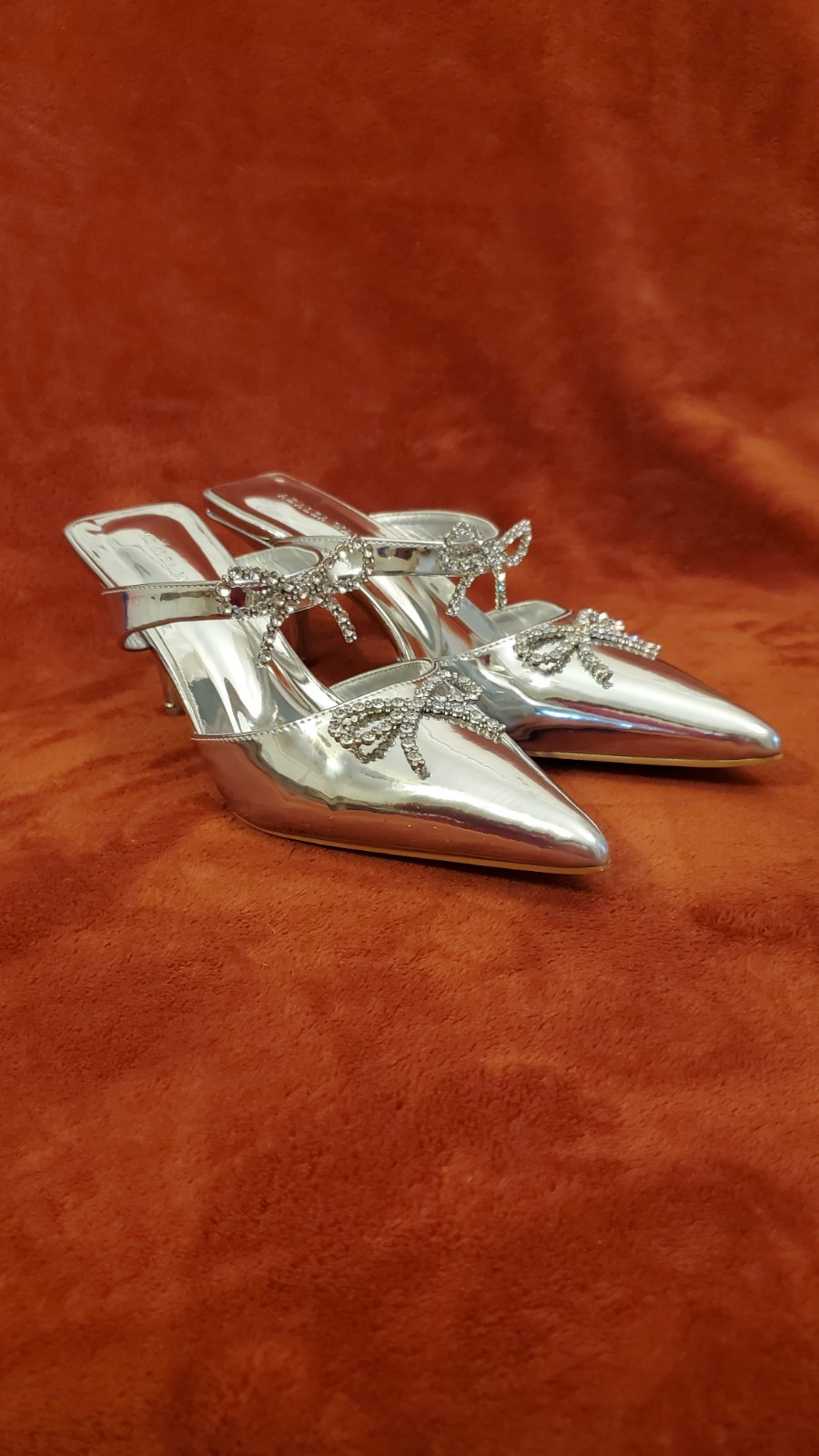 AZALEA WANG SILVER METALLIC MULES WITH SPARKLY RHINESTONE BOWS