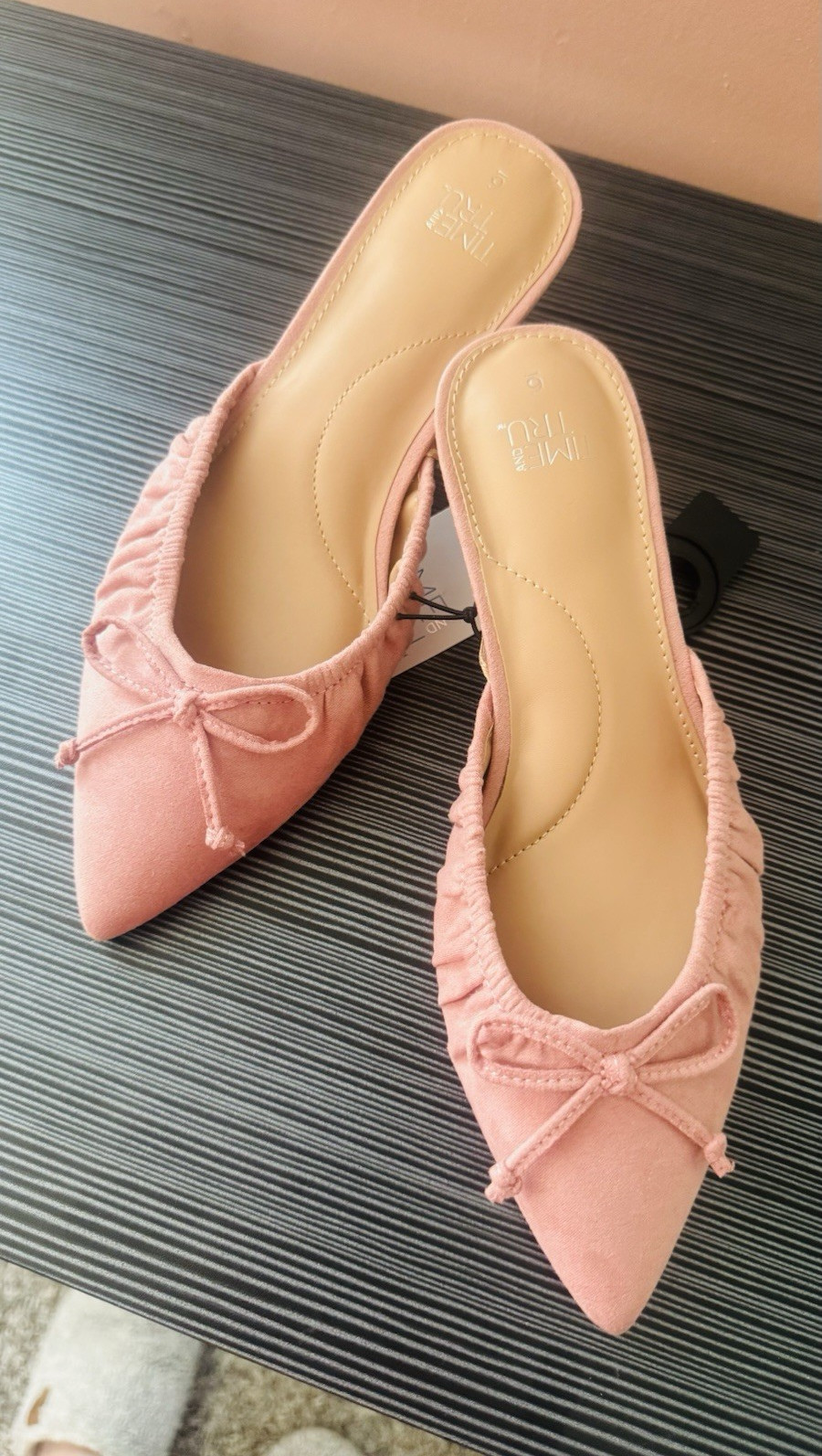 Time and Tru women’s faux suede kitten heel mules feature a charming bow a
