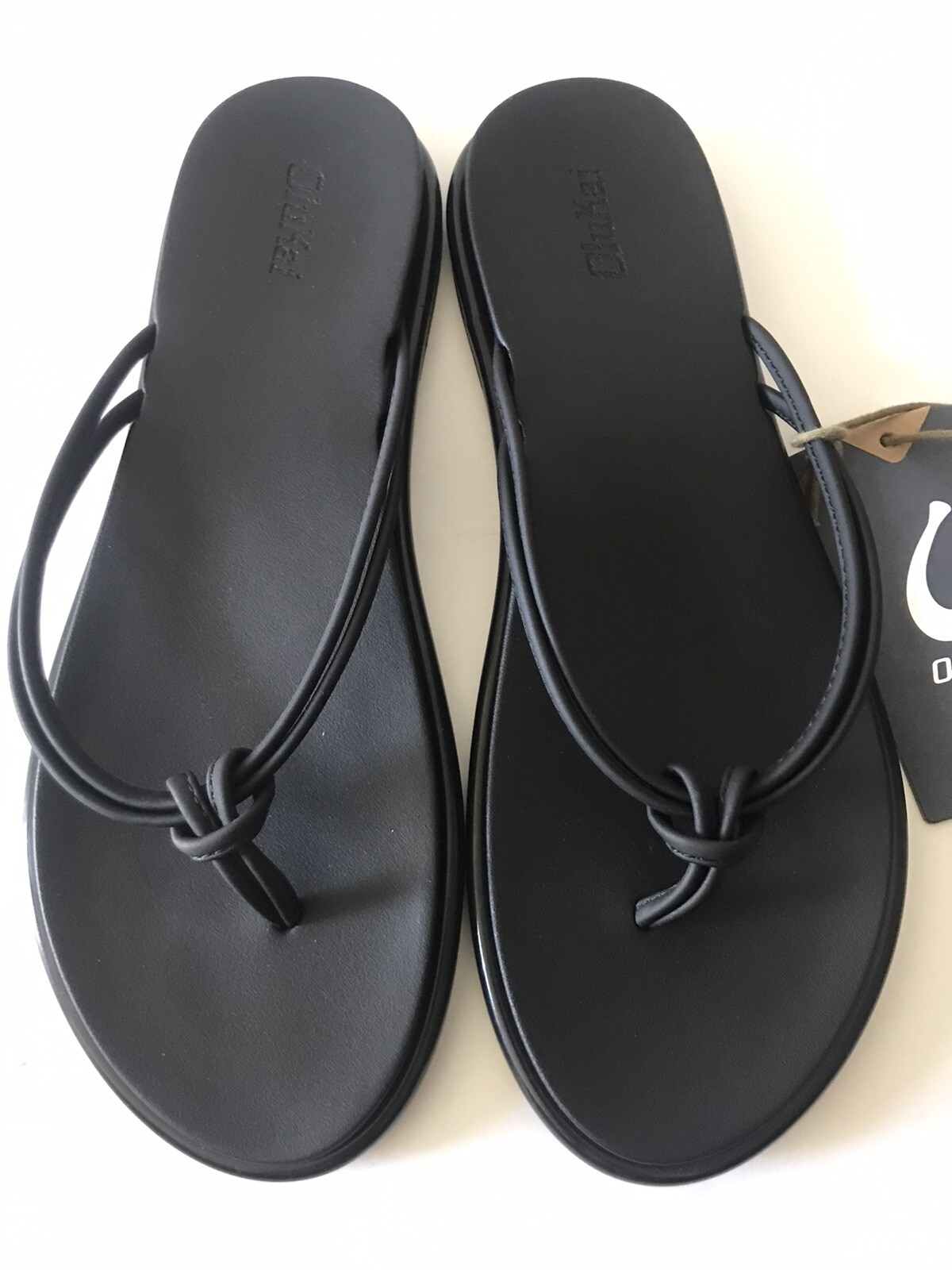 WOMEN’S OLUKAI BLACK ‘AKA KNOTTED STRAPS BEACH/POOL FLIP FLOP SANDALS SIZE 9 NWT