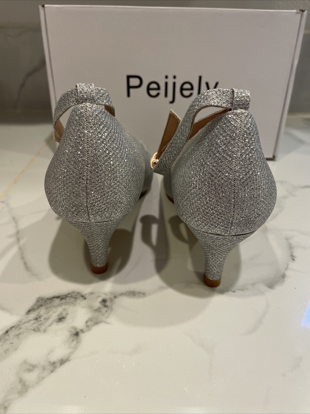 Peijely Women’s silver glitter round Toe 2 inch Heel 8.5