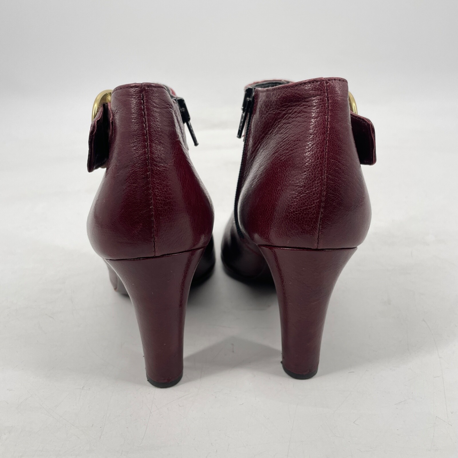 Coach Womens 7.5 B Burgundy kid Leather Nicolete Gold Buckle 3.25″ Heel Bootie