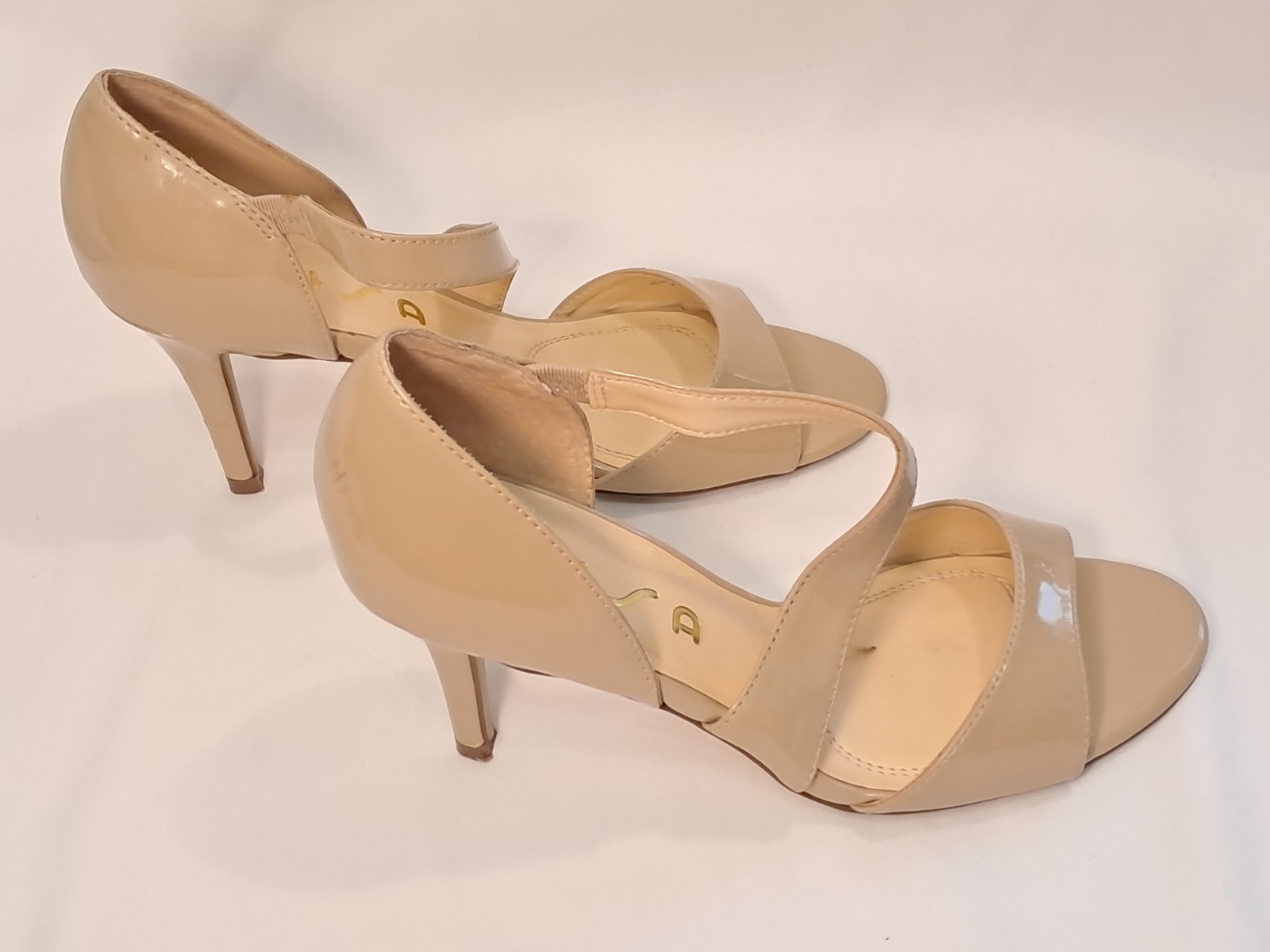 Unisa Size 6.5M Beige/Nude Patent Pumps 3.25″ Stiletto Heel Asymmetric Strap