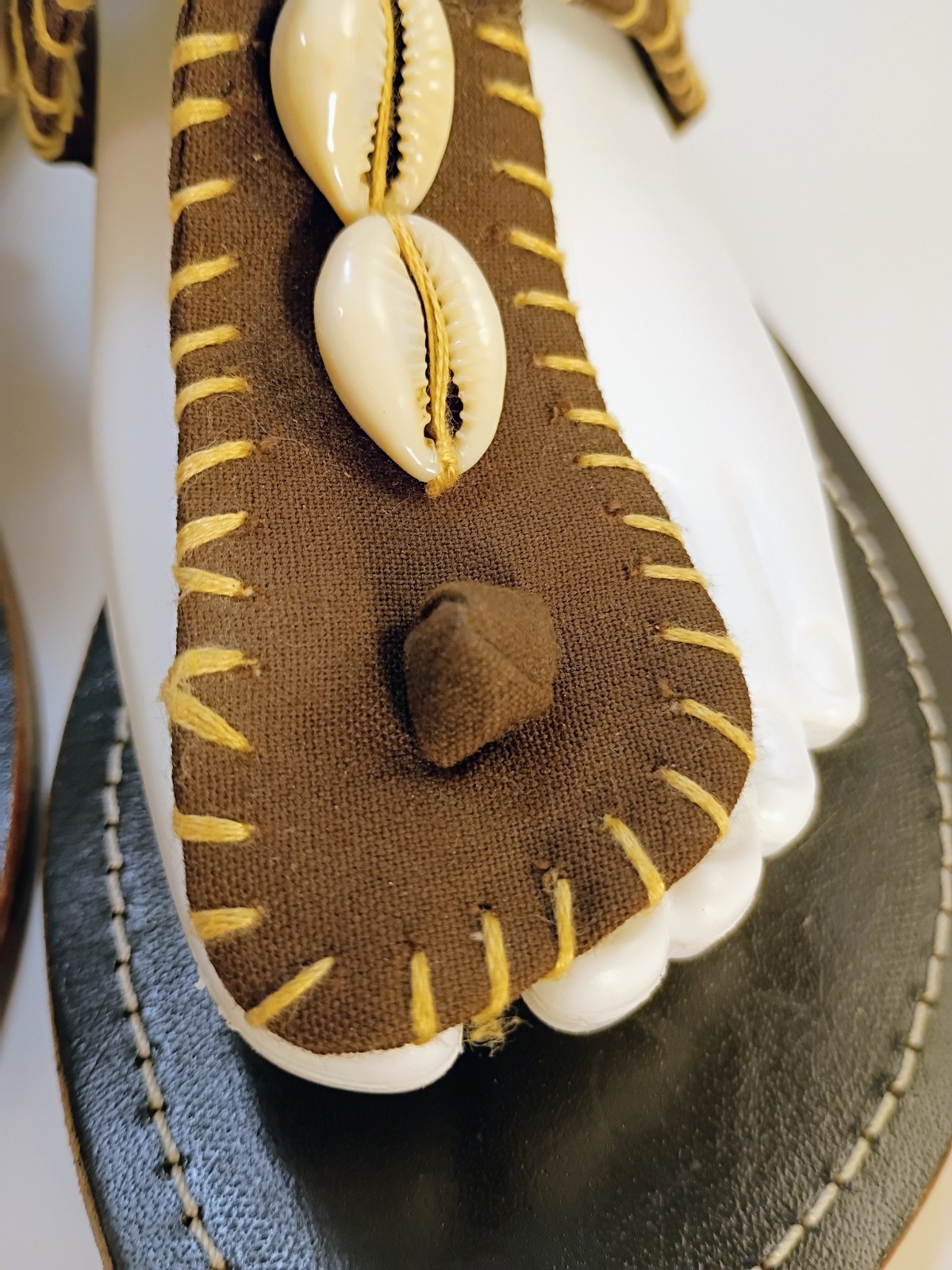 WHITE MOUNTAIN Cowrie Shell Maasai Brown Stiched Fabric & Leather Thong Sandals