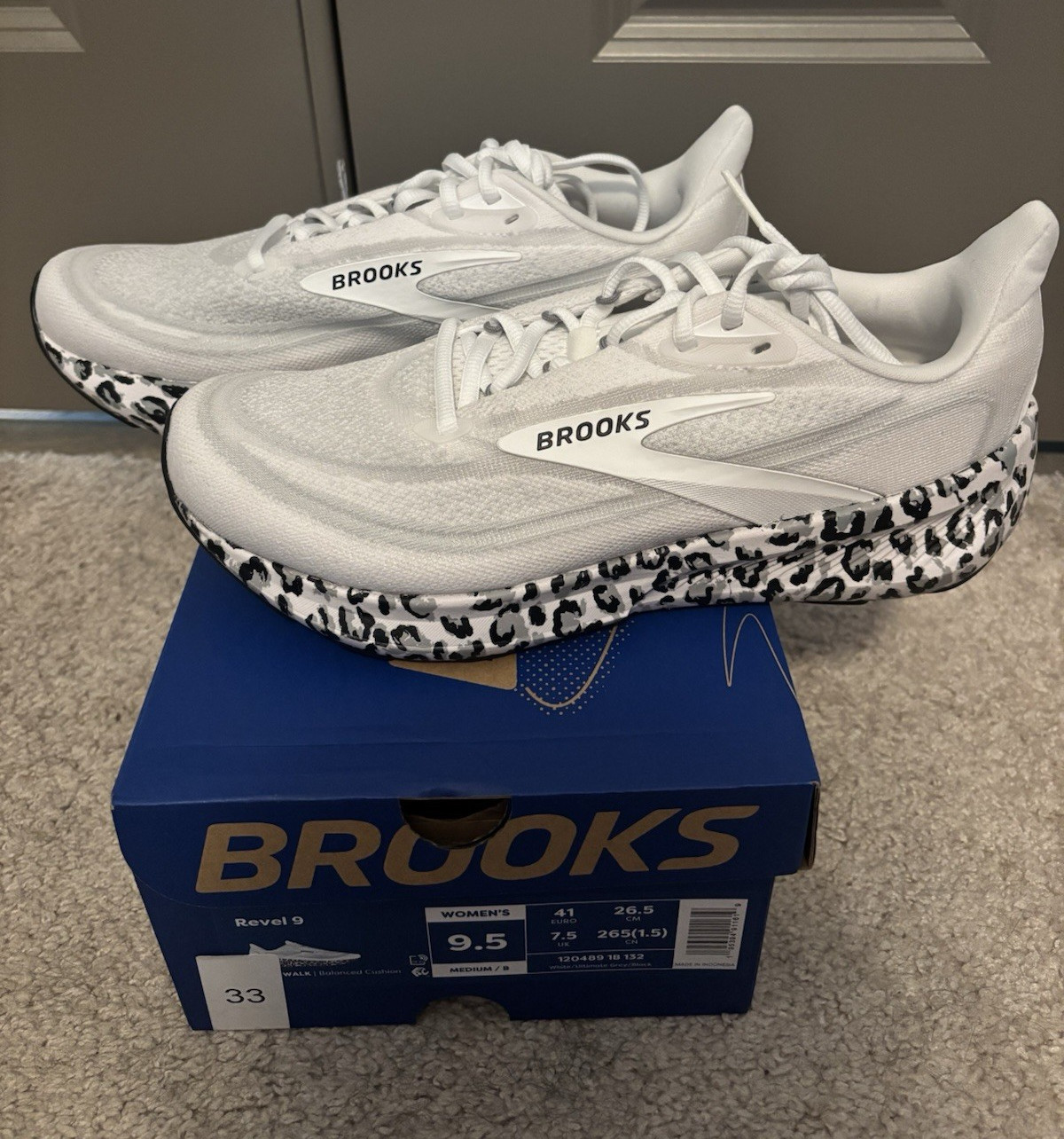 Brooks Revel 9 Low Top Lace Up Athletic Sneaker White/Black Rubber Outsole