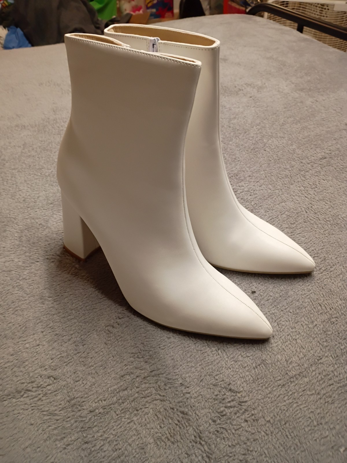 White faux leather ankle boots