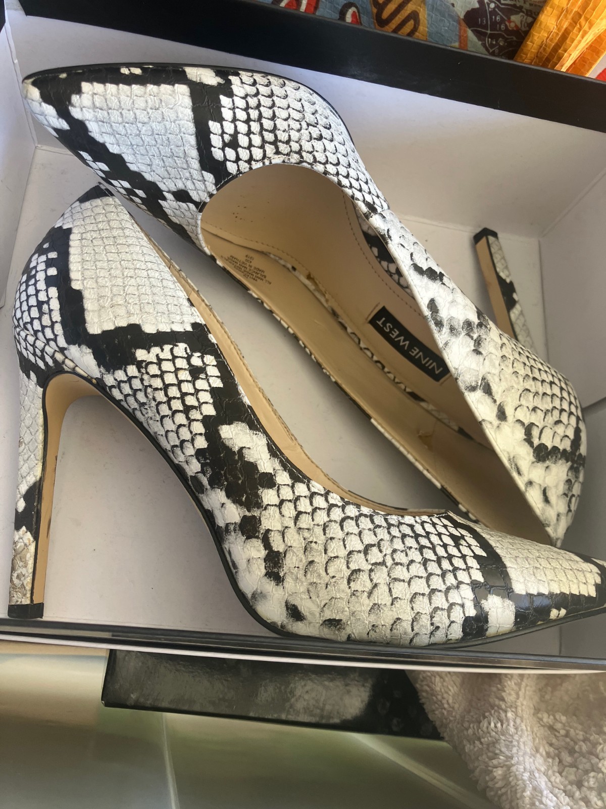 Nine West Black and White Snake Skin Stiletto Pumps, size 7.