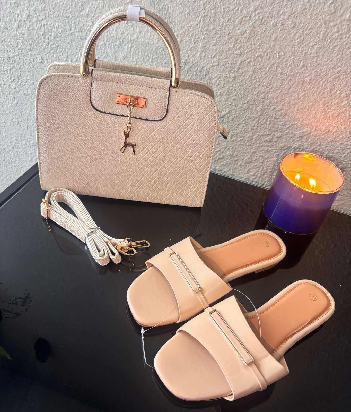 New women’s handbags and flat sandals. Available separately or as a set.
