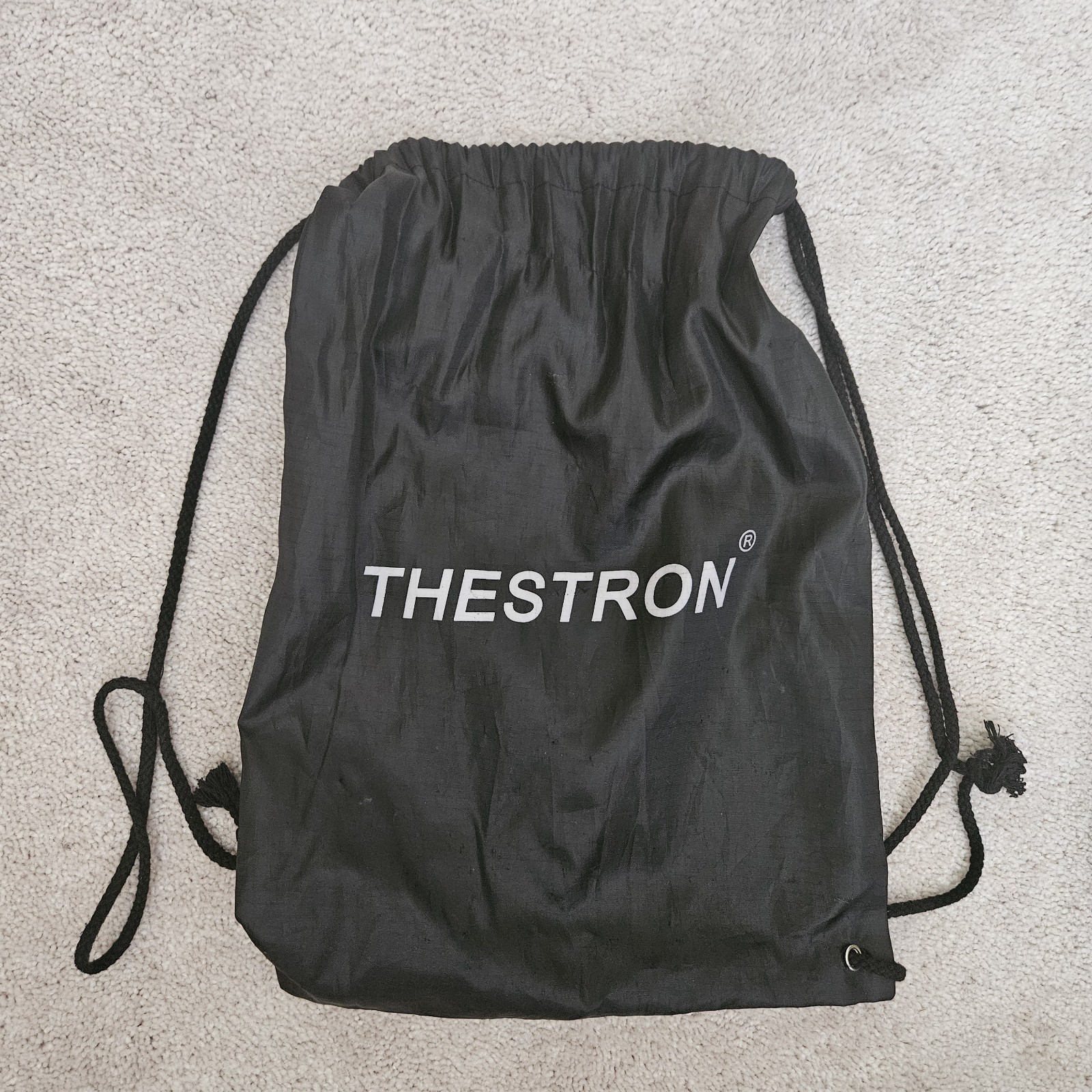 Track Spikes with extra spikes, wrench, and drawstring bag.