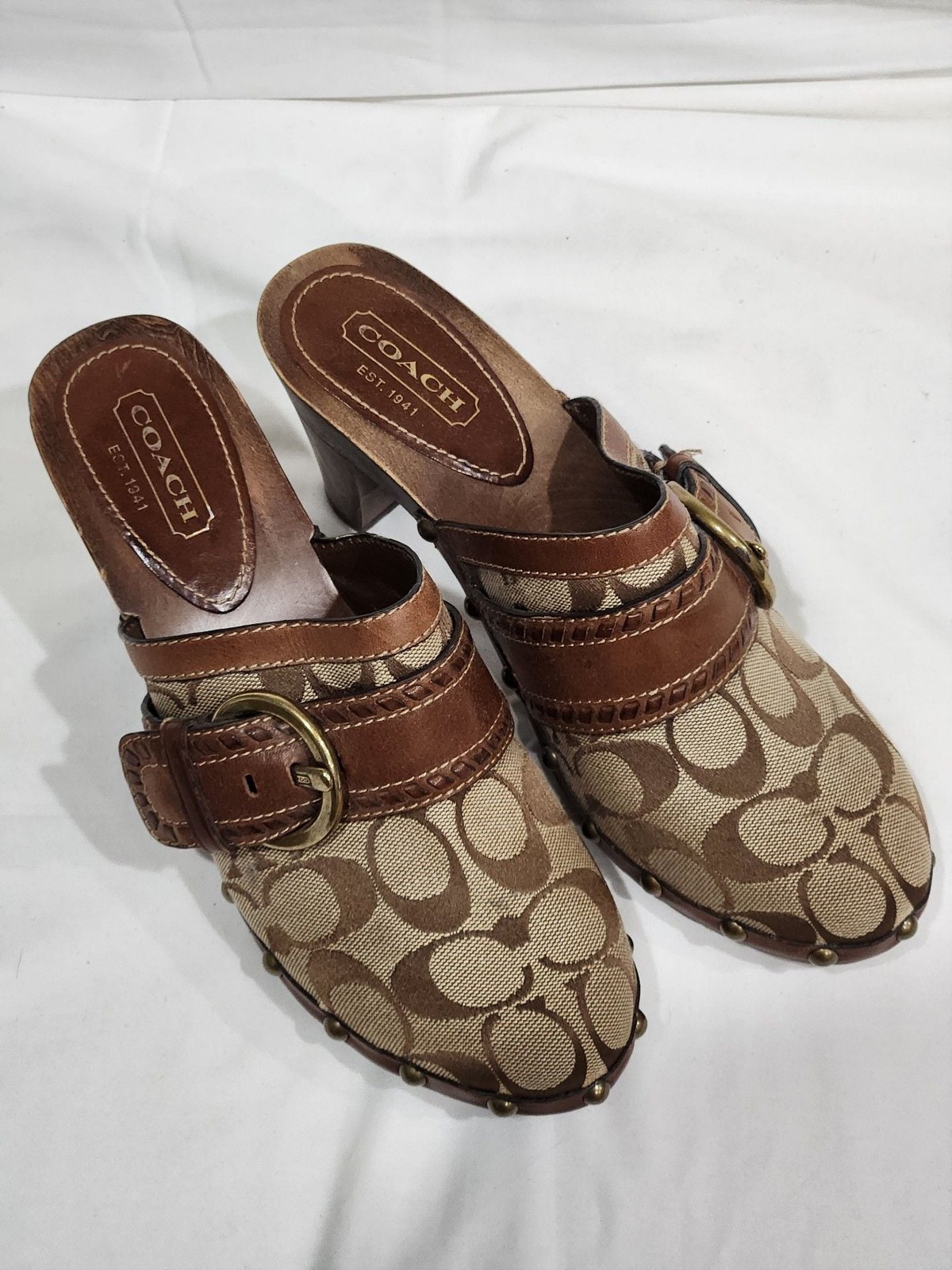 Coach Sable Signature Monogram Brown Fabric and Leather Buckle Studded Clogs