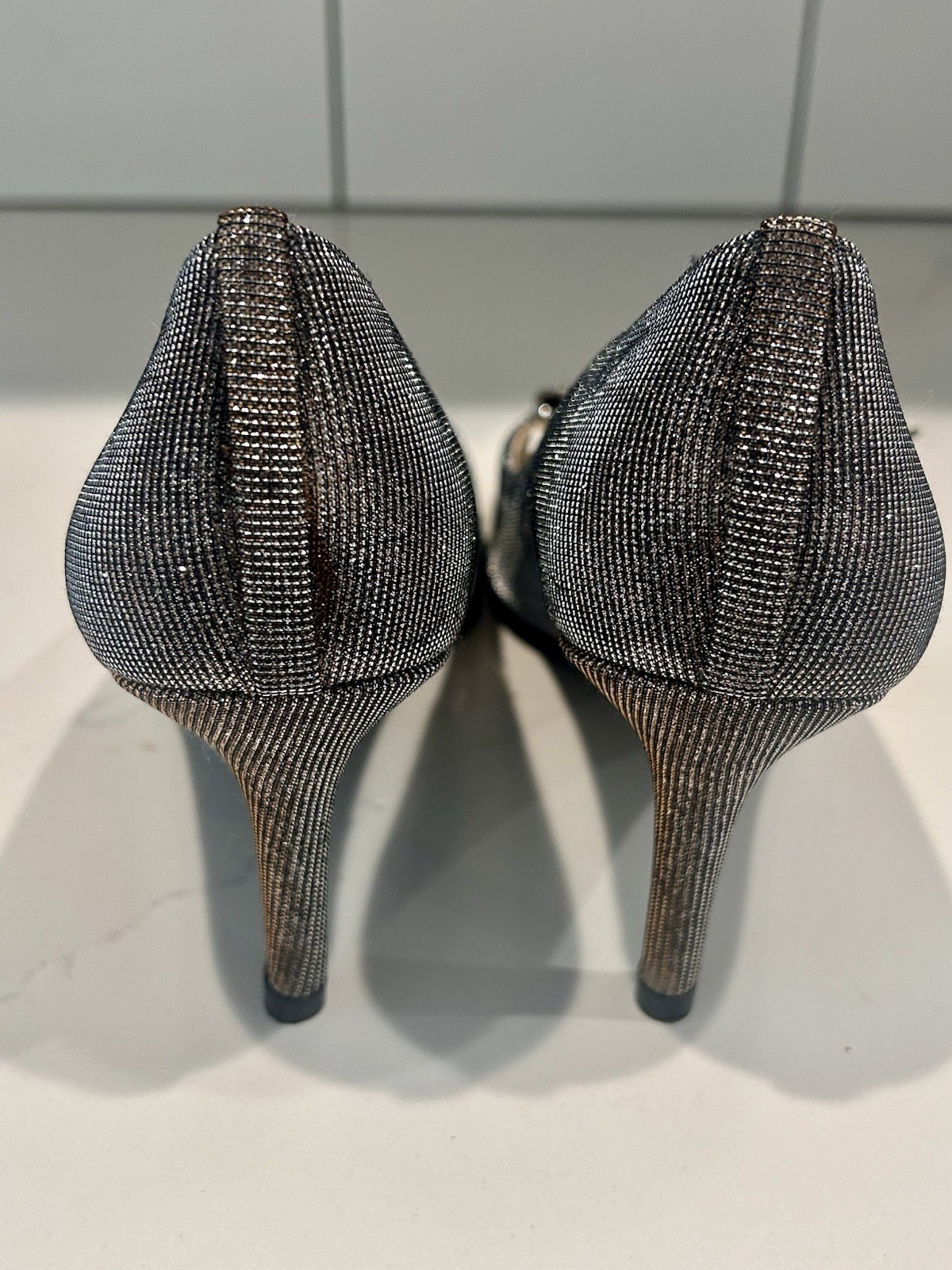 Stuart Weitzman «Bowover» peep-toe pump in a bronze/pewter glitter finish 8