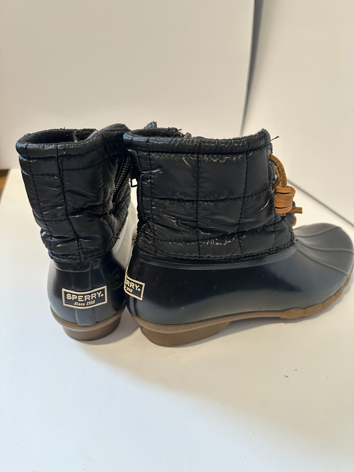 Sperry Woman’s Saltwater Core Duck Boots in Black with a Quilted Textile Shaft