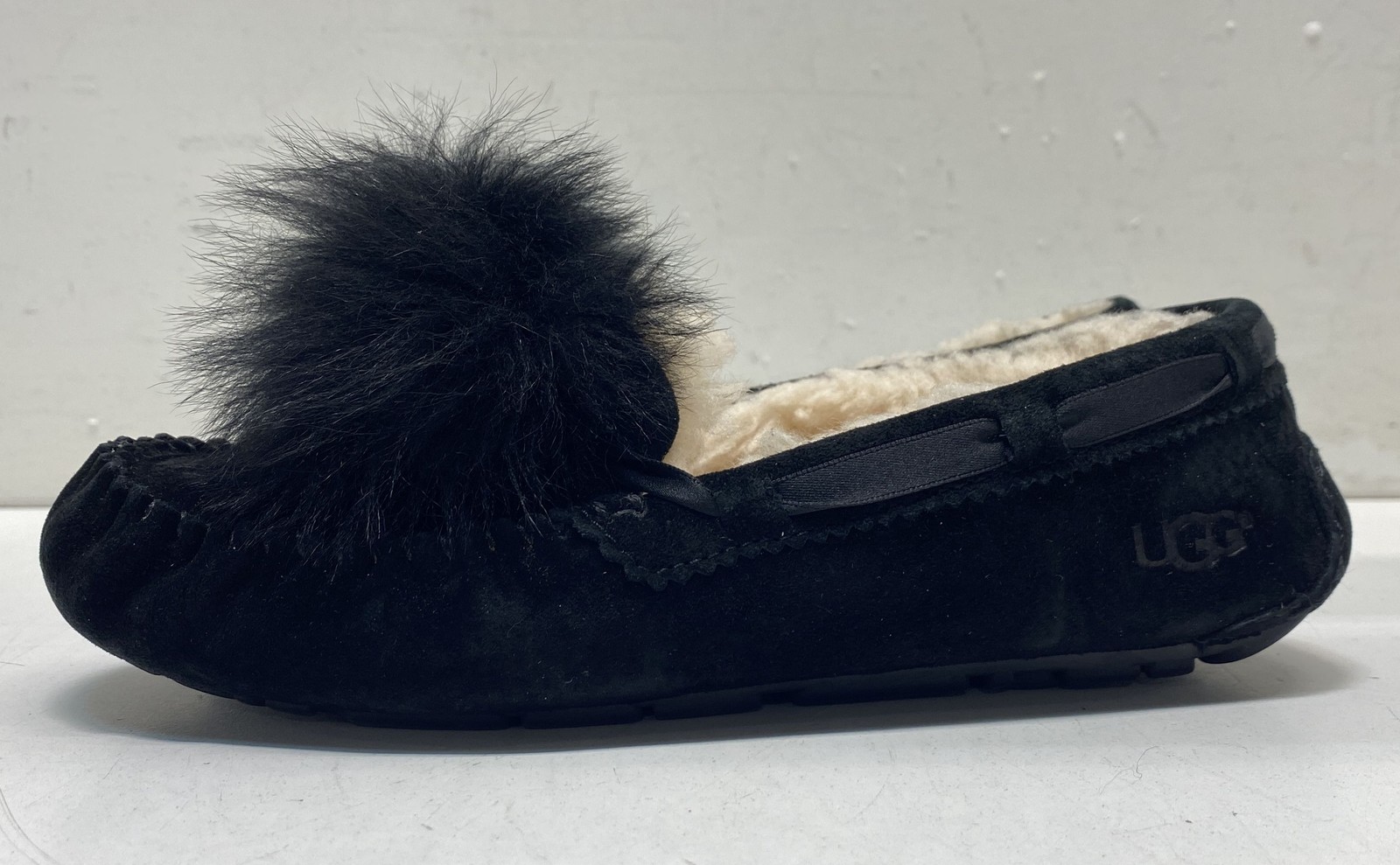 UGG Dakota Pom Pom Black Suede Moccasin Slippers Women’s