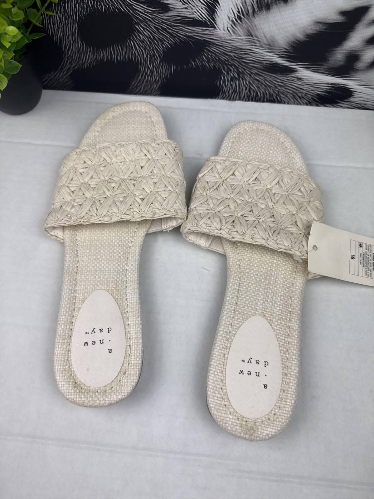 Step into effortless style and comfort with these beautiful woven slide sandals