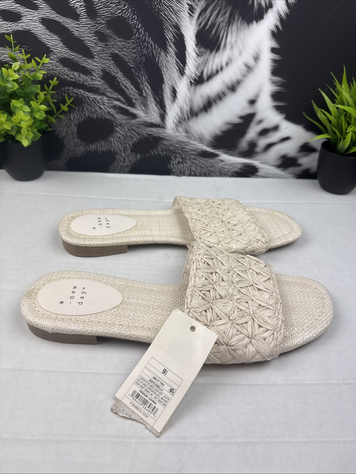 Step into effortless style and comfort with these beautiful woven slide sandals