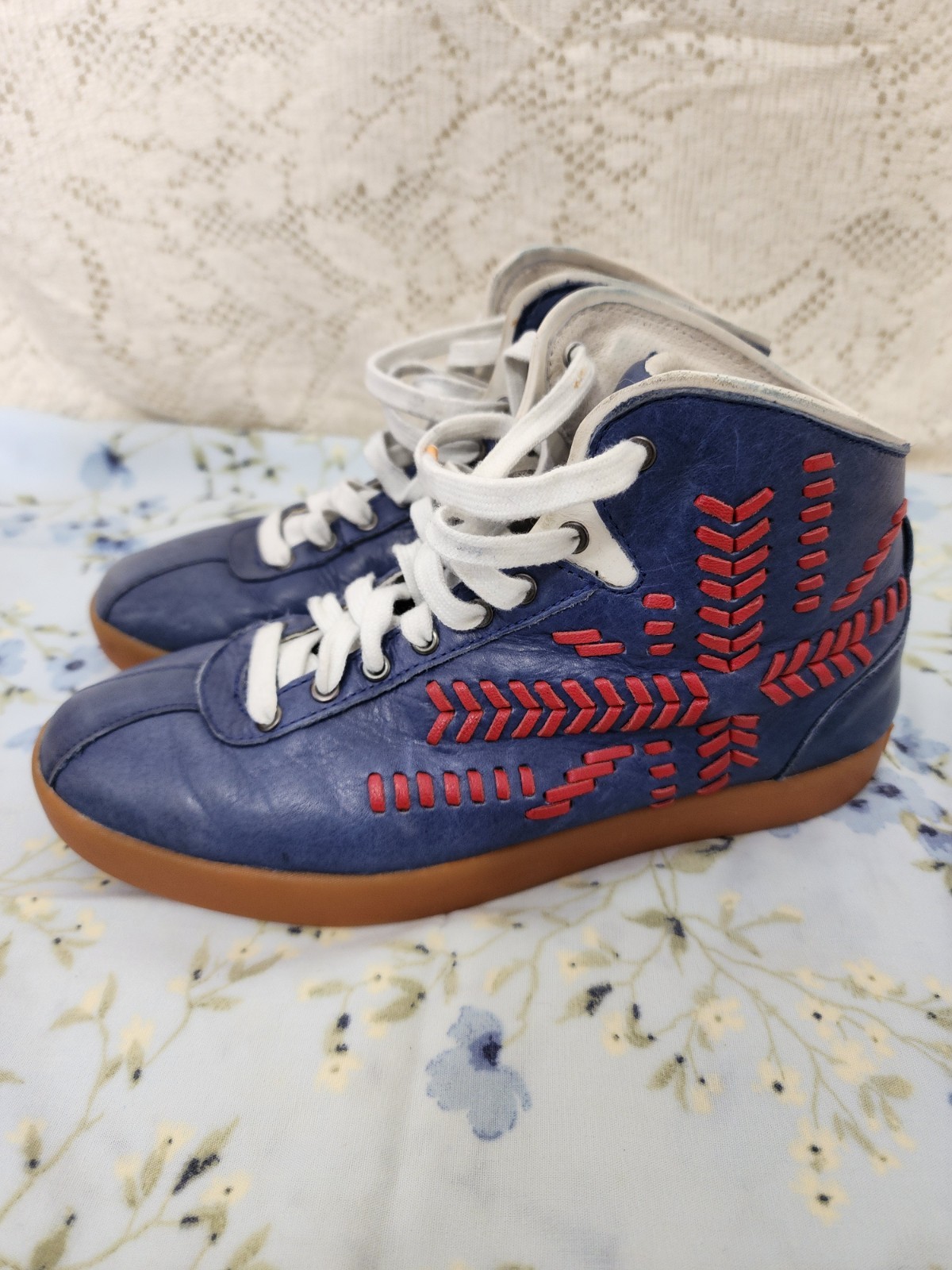 Alexander McQueen for PUMA Medius Mid leather sneaker in blue with red stitching