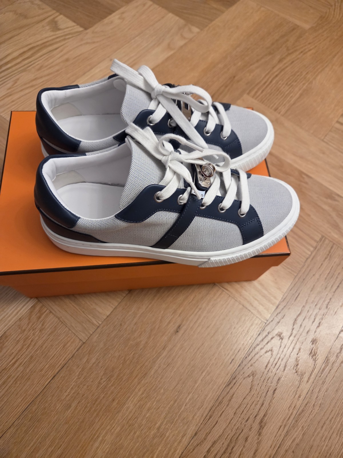 Authentic Hermès Day Sneakers in Bleu/Bleu Céleste featuring iconic Kelly Buckle