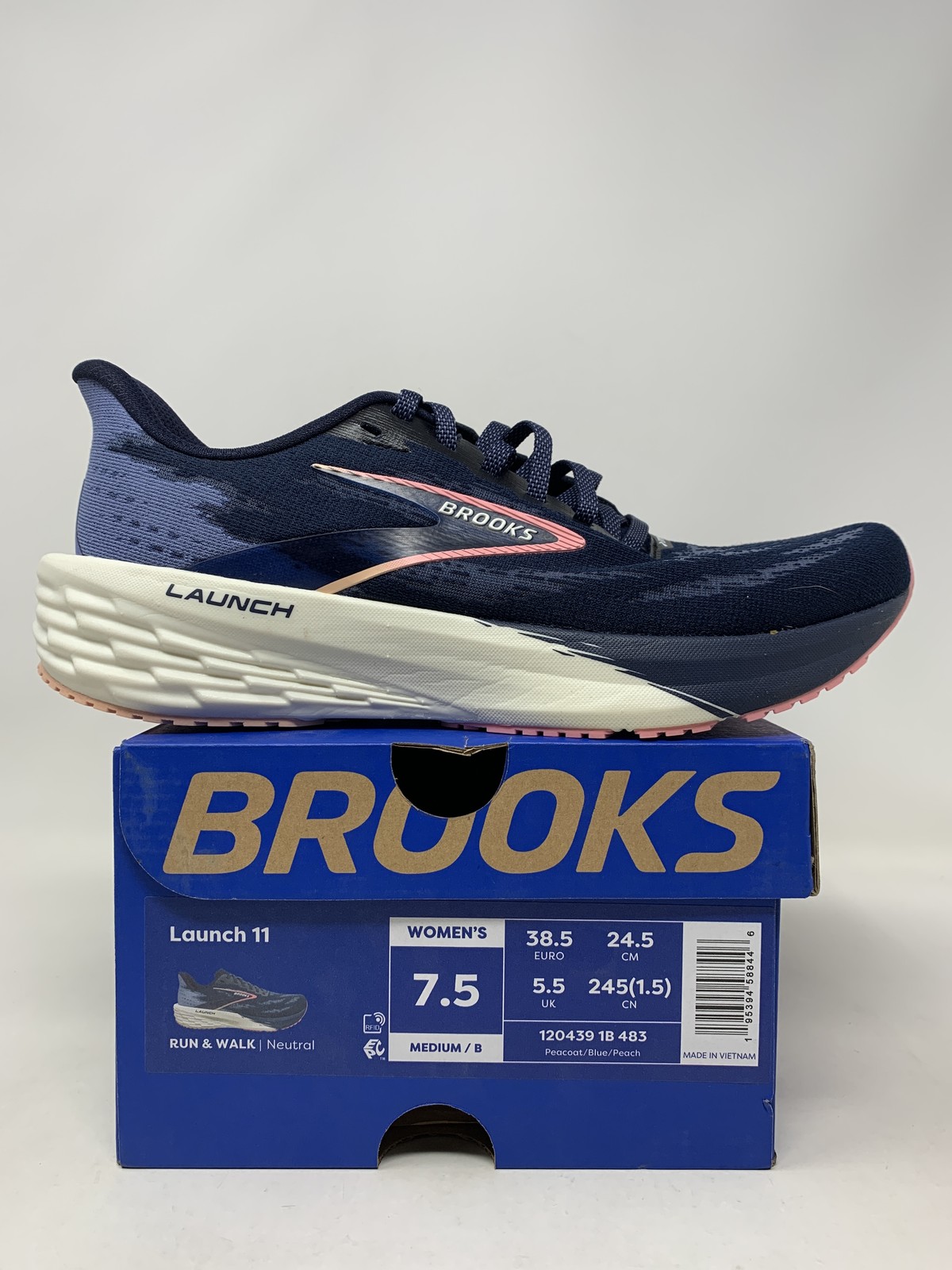 Women’s Brooks Launch 11, Peacoat/Blue/Peach, 7.5 B Medium US