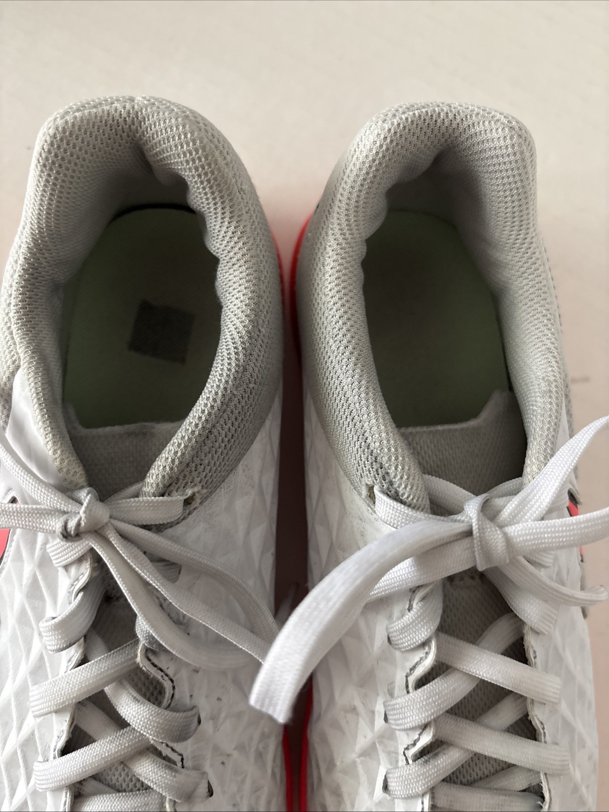 Pink and White Nike Tiempo legend running shoes Women’s Size 7