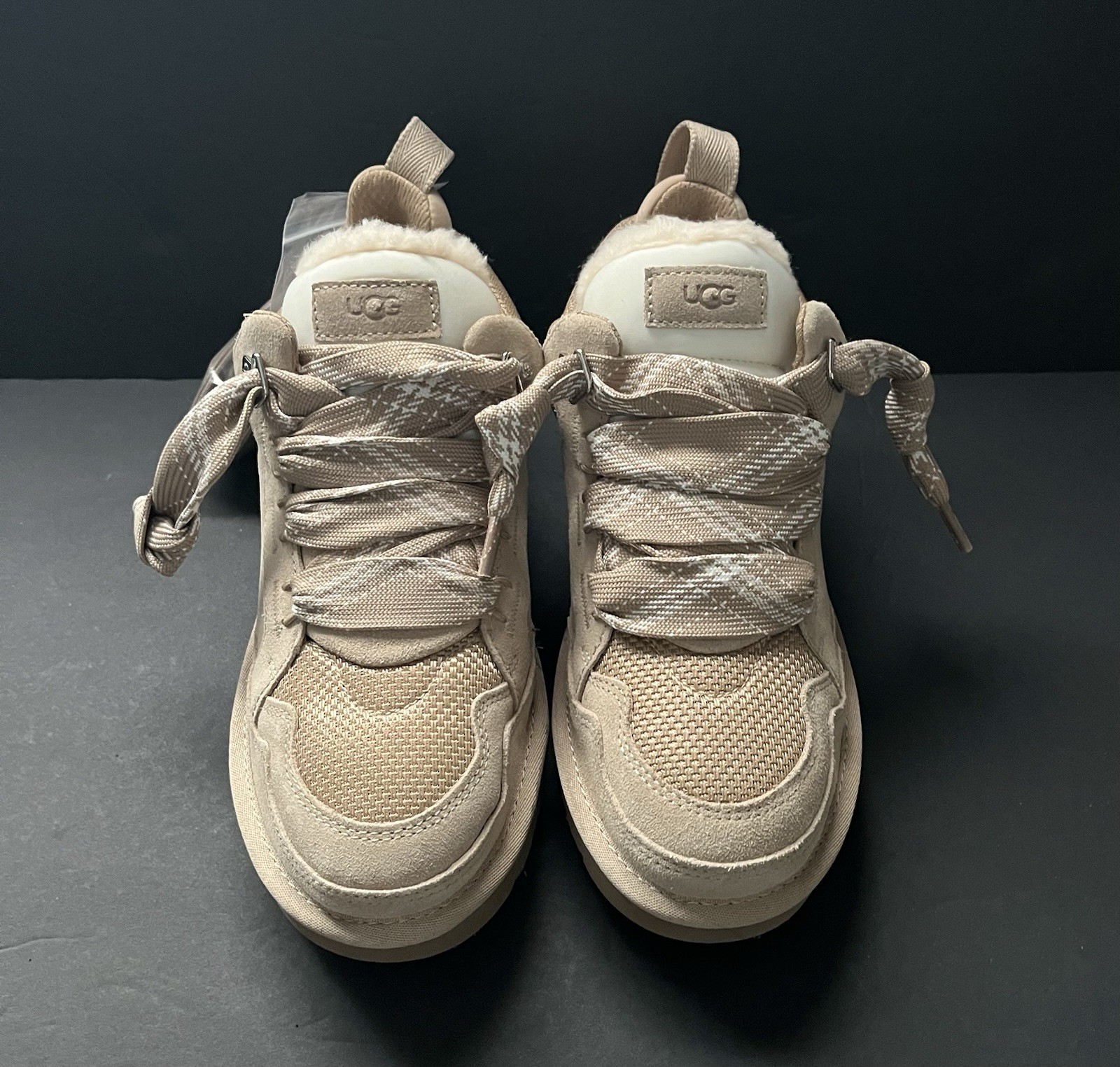 New, No Box UGG Women’s Lowmel Suede Sneaker in Sand Color. Size US 9