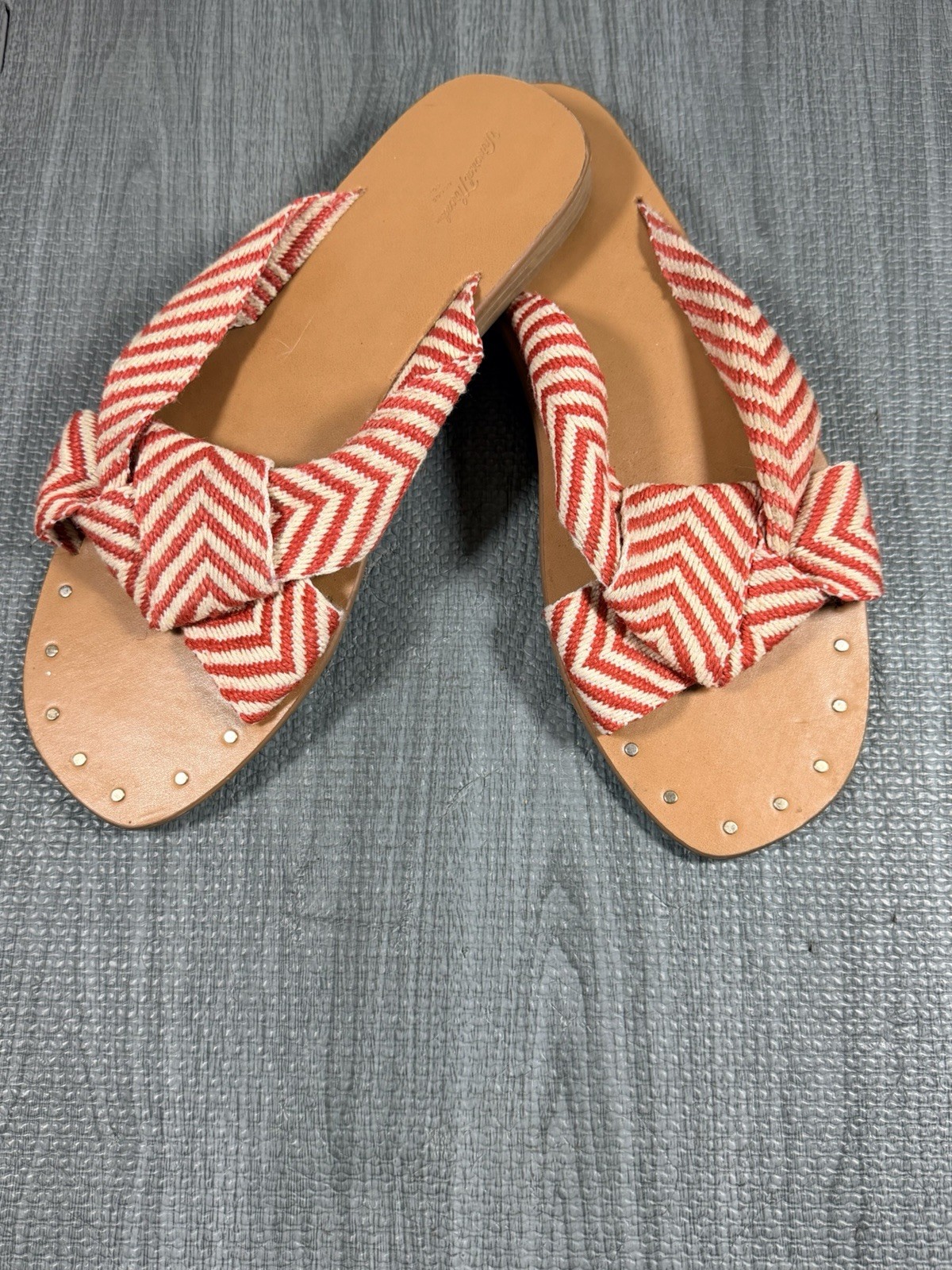 Red and White Chevron Patterned Slip-On Sandals with Studded Toe Detail