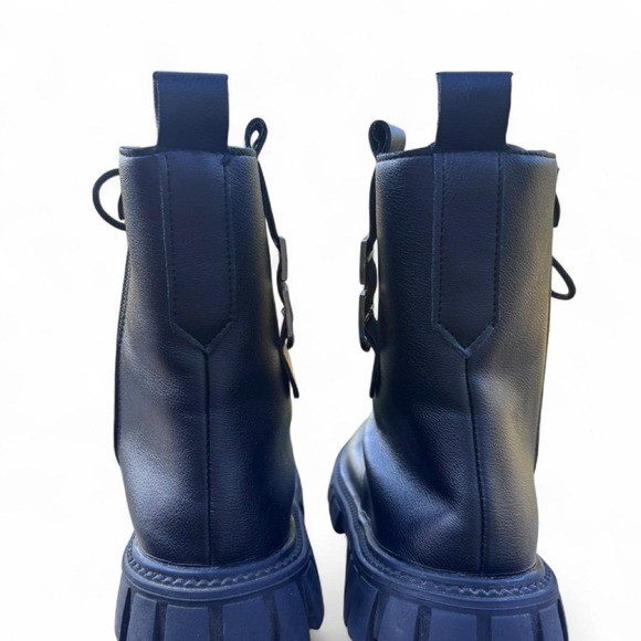 Woman’s black punk boots