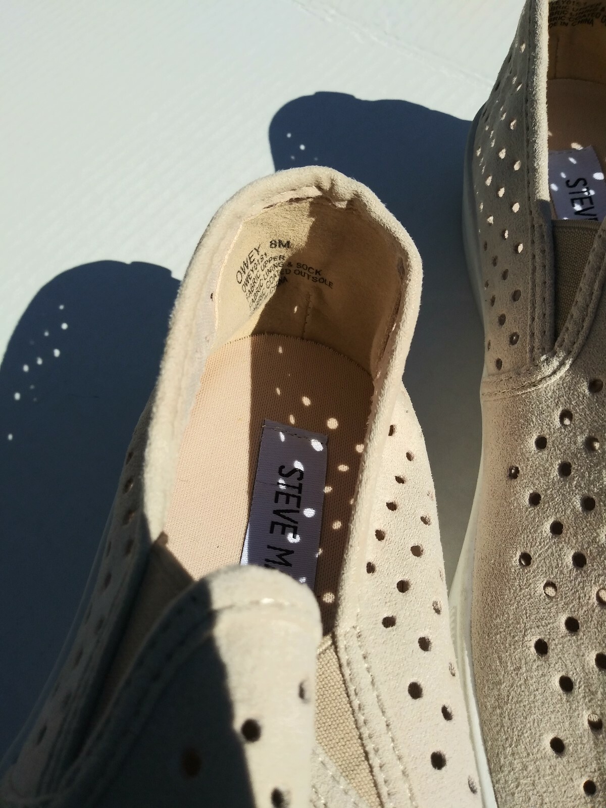 Steve Madden Owey perforated slip-on sneaker (Different Sizes – Left 7, Right 8)